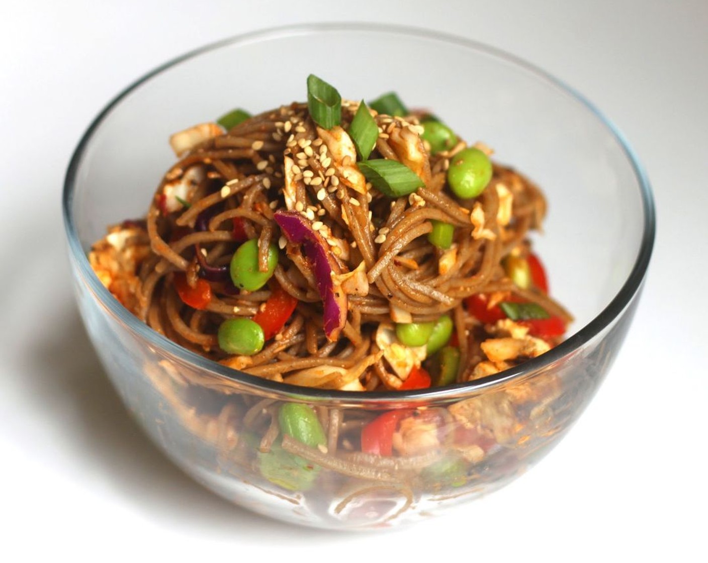 step 9 When the tofu and peppers are done, allow to cool a bit, then cube the tofu and toss with the noodles. If the final dish seems a little dry, add a bit more korean korean sweet and spicy sauce and sesame oil. Enjoy!