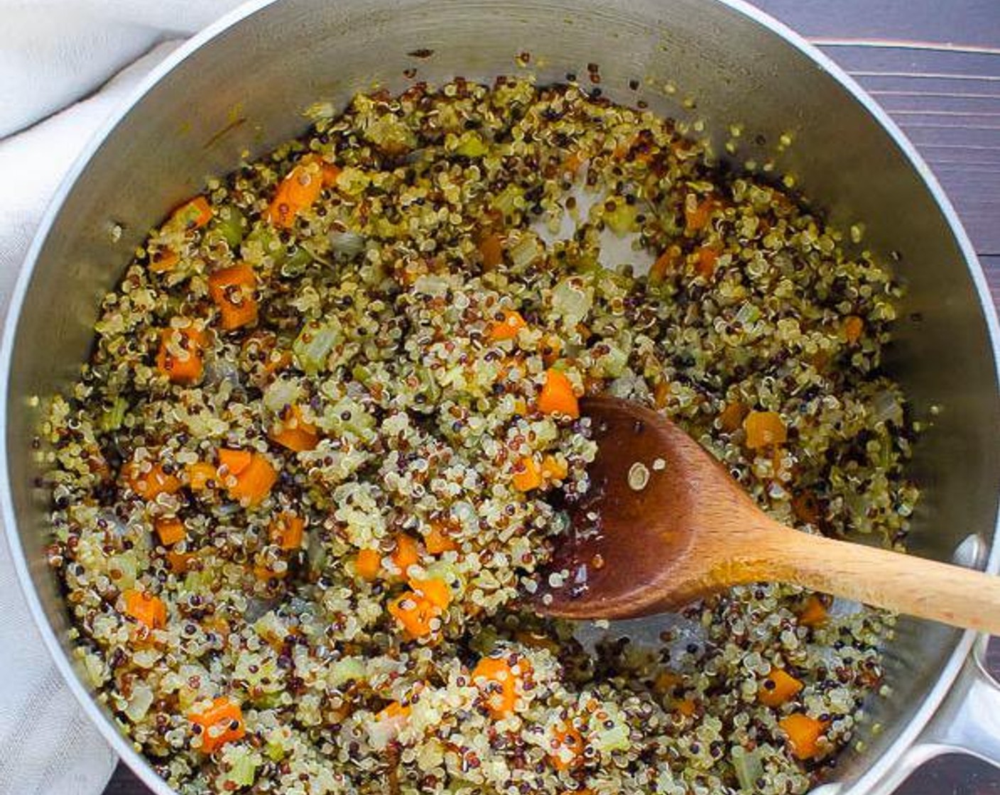 step 4 Cover pot with a lid and reduce heat to low. Simmer for 15 minutes until quinoa is tender and has given off its little spiral germ. While quinoa and lentils cook, make the shallots vinaigrette.