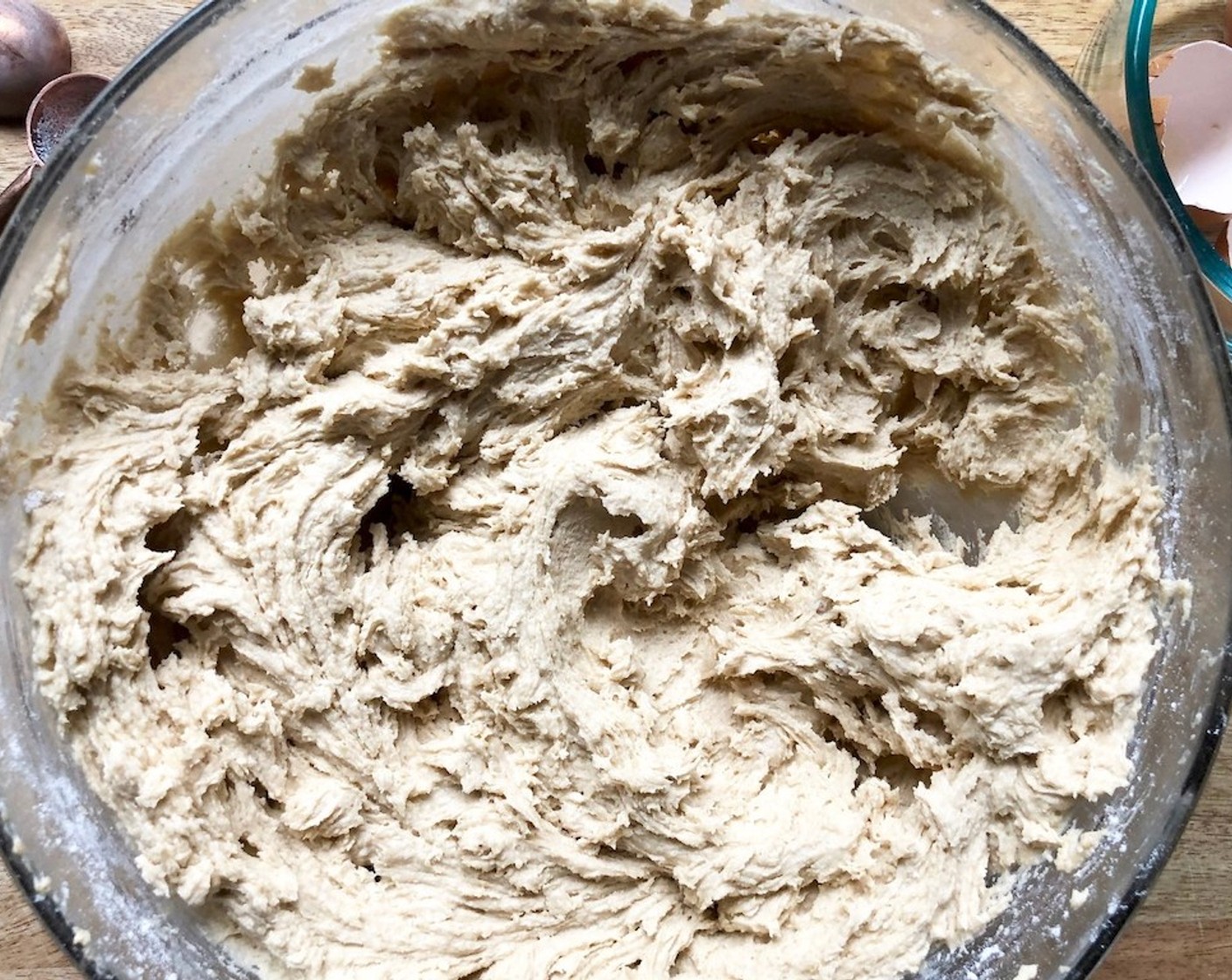 step 4 Meanwhile, sift the All-Purpose Flour (1 3/4 cups), Baking Soda (1 tsp), and Salt (1/2 tsp) into a medium bowl. With the mixer on low, slowly add the flour mixture to the butter-sugar mixture. Be cautious not to overbeat it.