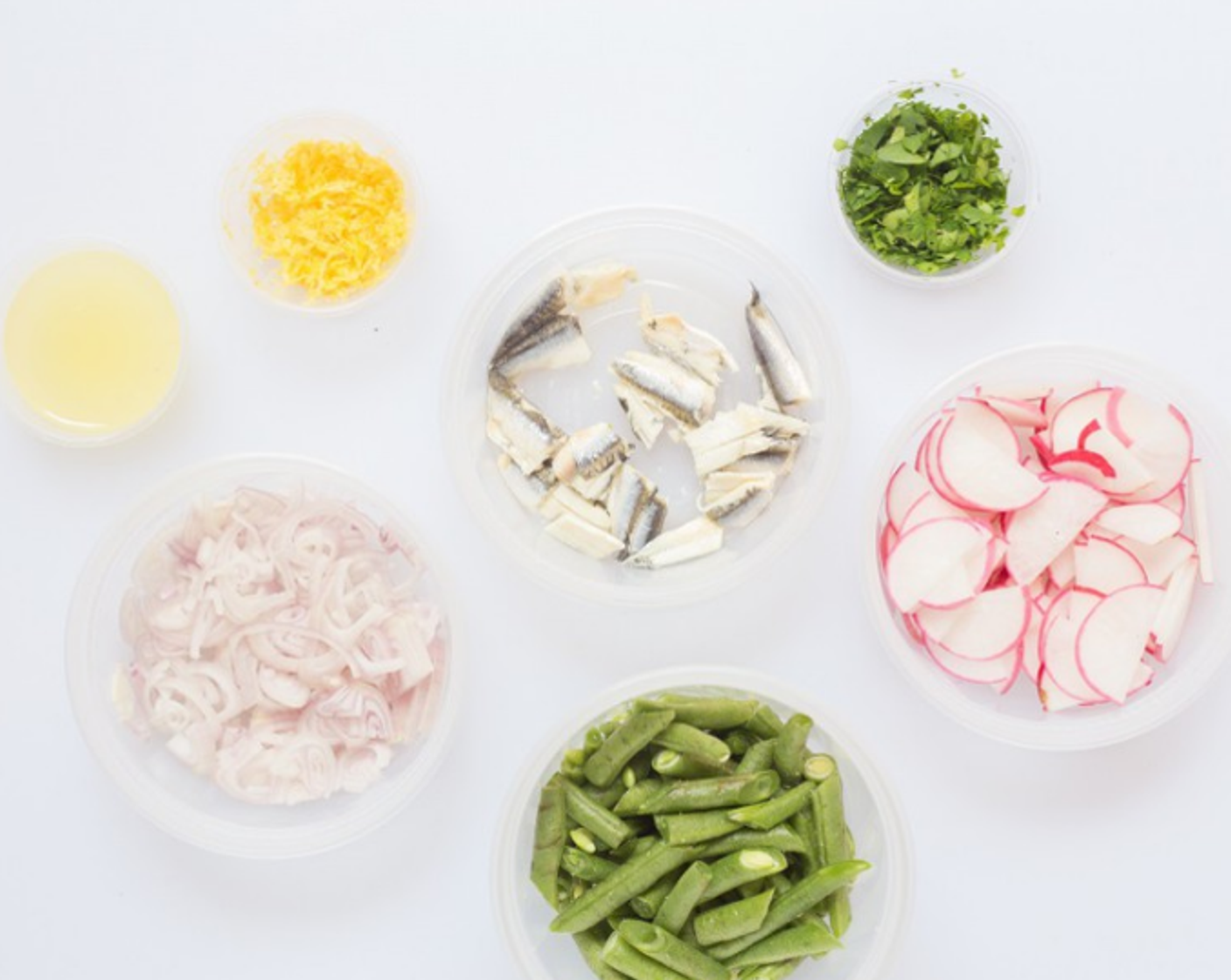 step 2 Zest and juice the Lemon (1), measure out 1/2 tsp lemon juice - reserve remainder for another use. Halve and thinly slice the Radishes (to taste). Pick and chop Italian Flat-Leaf Parsley (to taste). Roughly chop Boquerones Marinated White Anchovies (to taste)