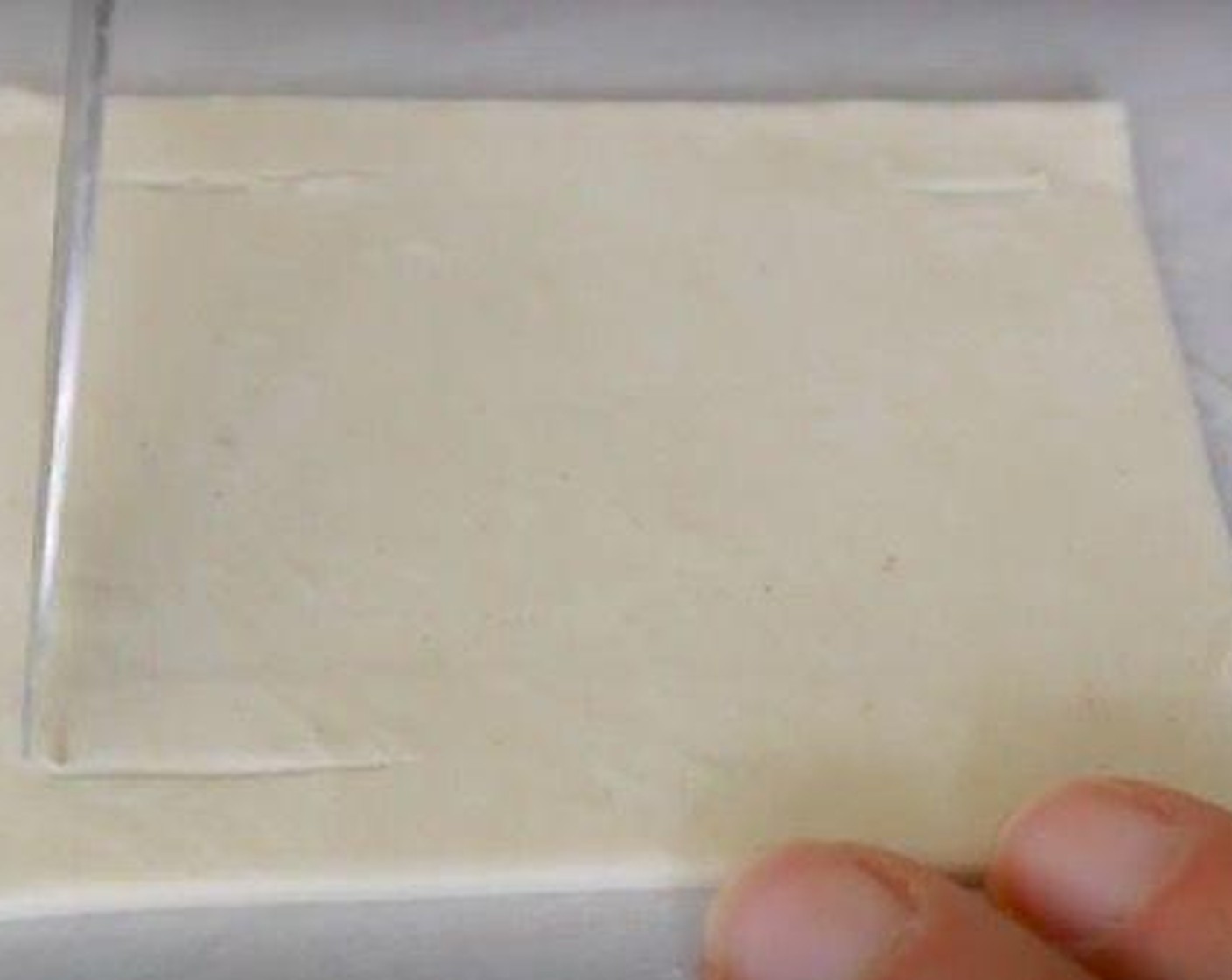 step 4 With a sharp knife make a cut in all 4 corners of the square.