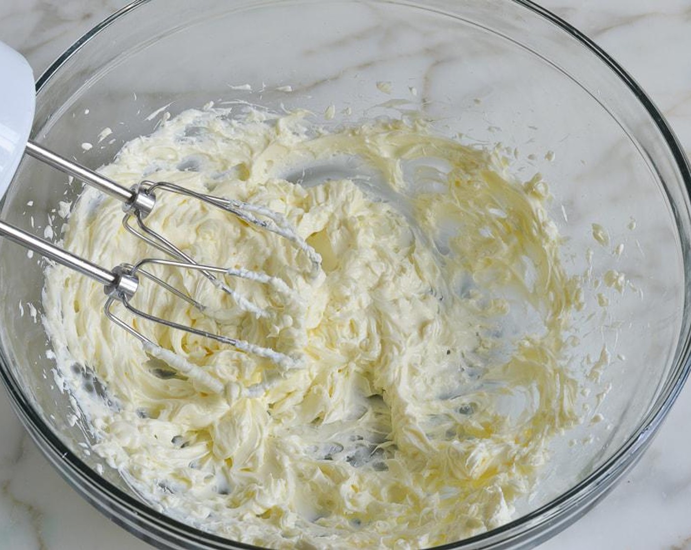 step 6 In the bowl of an electric mixer, beat the Cream Cheese (1 cup) until light and creamy, about 1 minute.