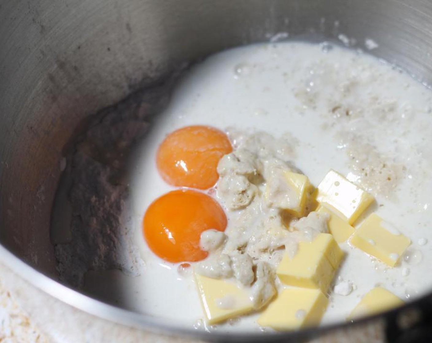 step 3 Combine the All-Purpose Flour (2 cups), Unsalted Butter (2 Tbsp), Eggs (2), and yeast mixture in the bowl of a stand mixer with the dough hook attached.