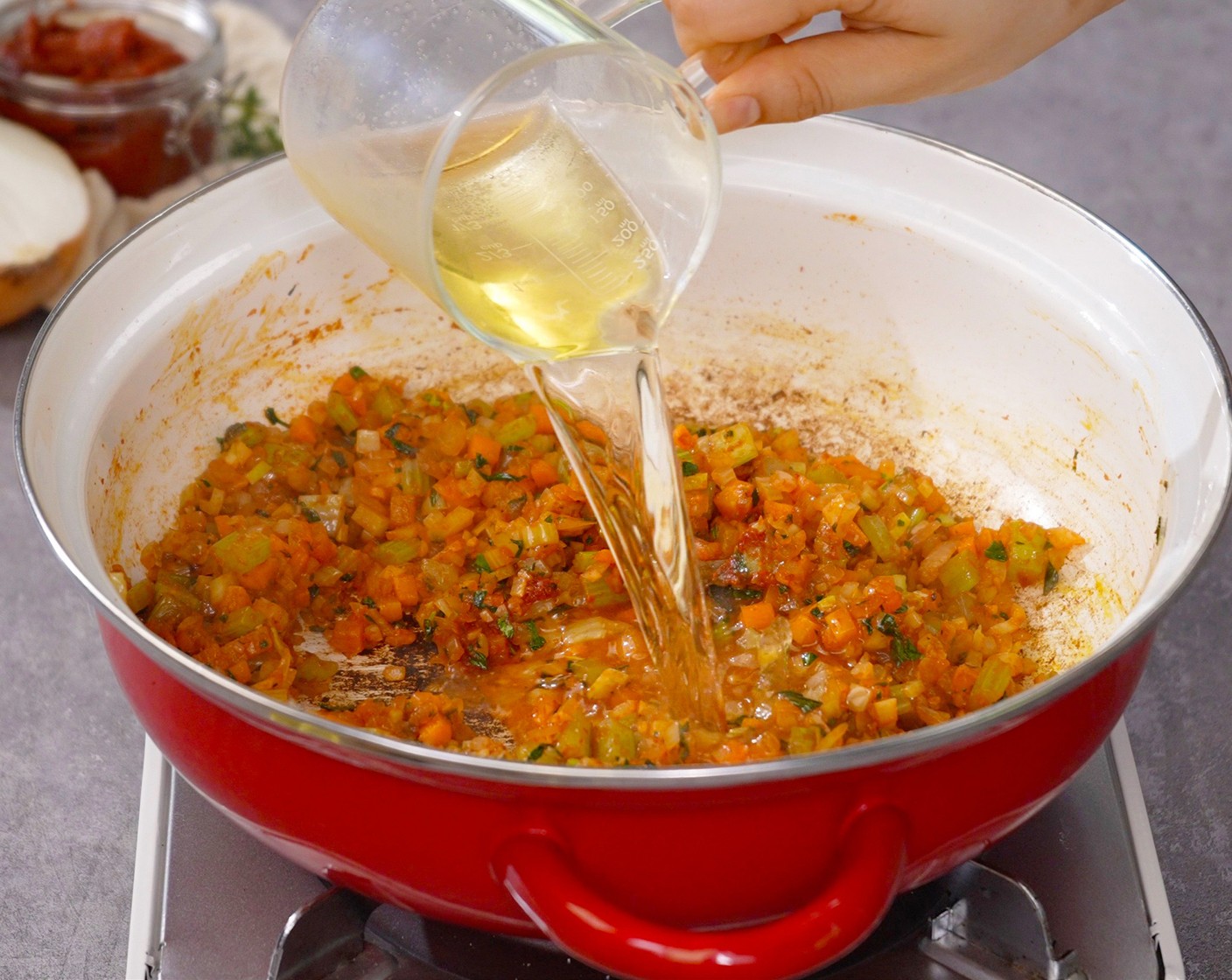 step 4 Pour in the Dry White Wine (1/2 cup), turn the heat up to medium-high, stir and let the liquid evaporate, cooking for about 1 minute.