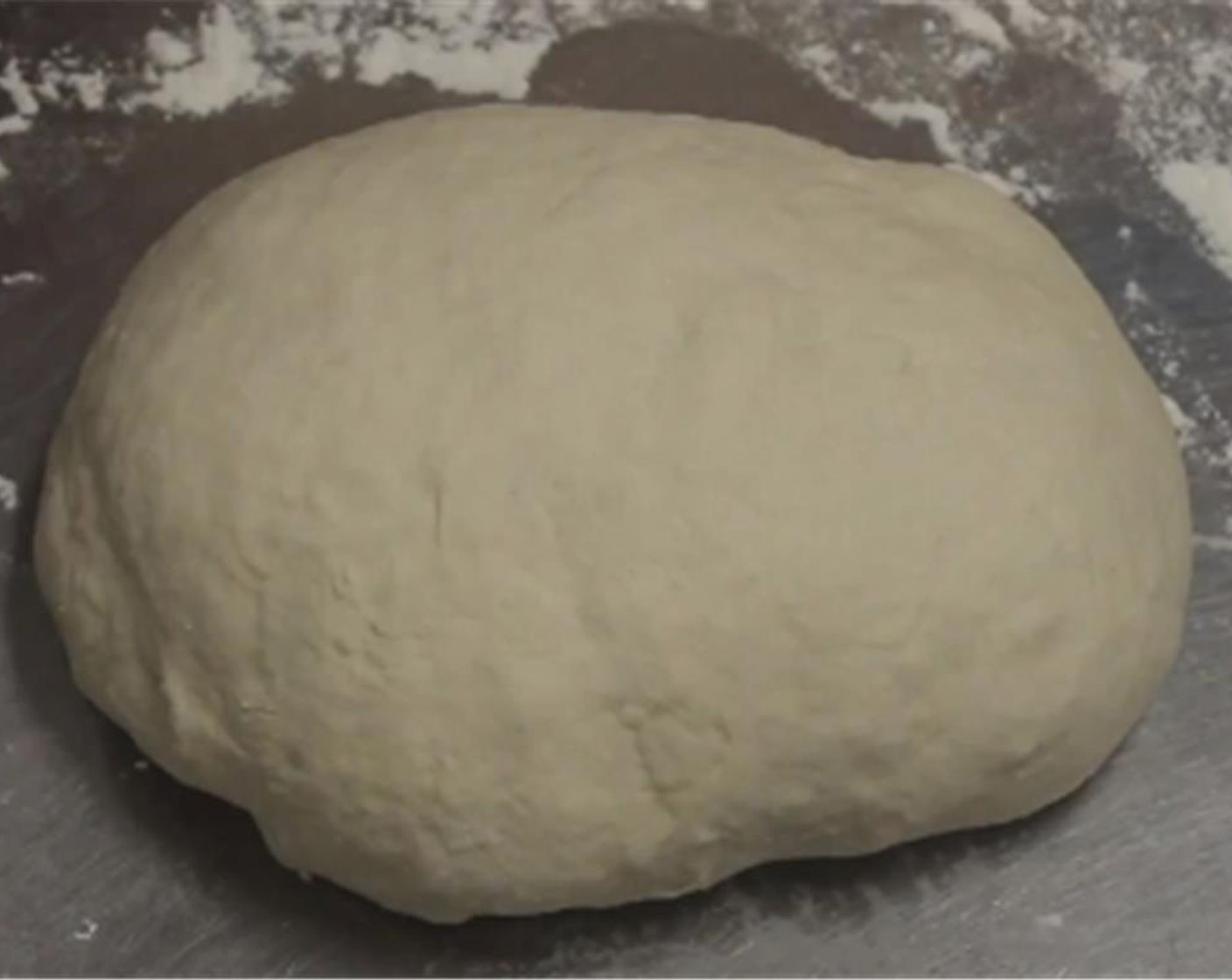 step 4 After the 20 minute rest, dust your work surface with flour, and kneed the dough (about 3-5 minutes) into a smooth ball.