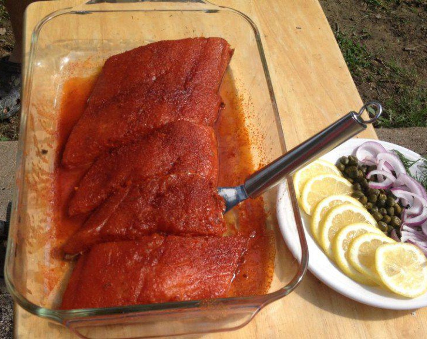 step 2 Brush the outside of the Salmon Fillets (6) with the butter mixture reserving the rest for basting later in the cook. Sprinkle each filet with Barbecue Rub (2 Tbsp) and place in a shallow dish.