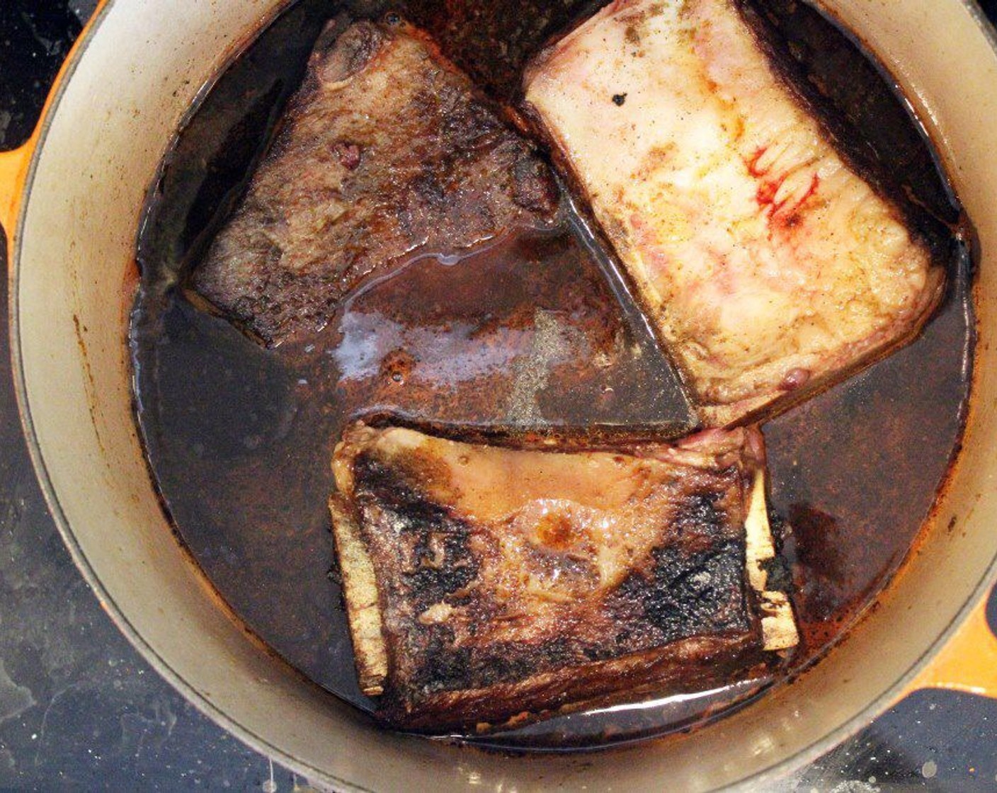 step 10 Pour the Beef Broth (4 cups) over the ribs until they are nearly covered, and we're ready to braise!