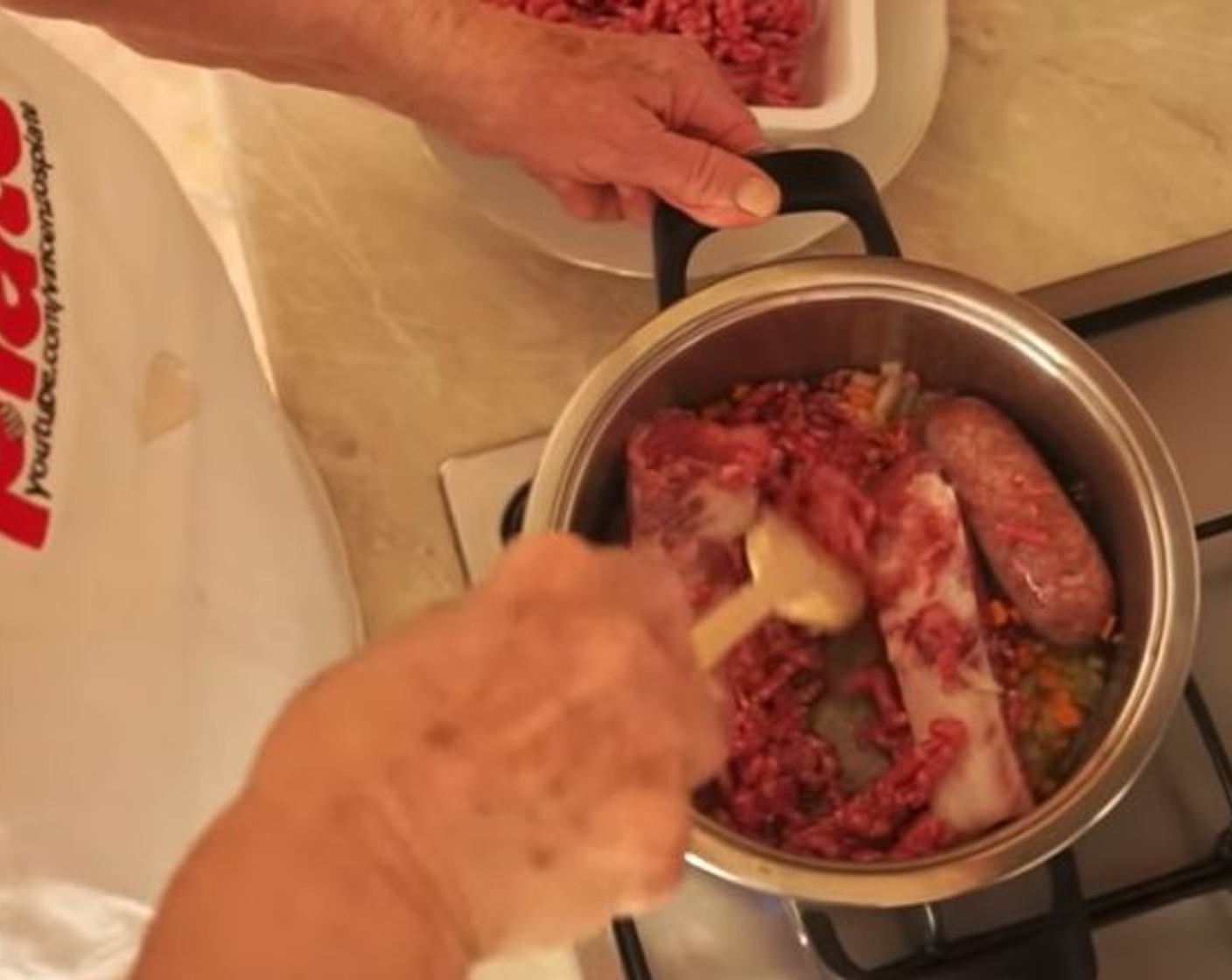 step 3 Mix the mince through so that it starts to brown and add some more Extra-Virgin Olive Oil (as needed) to help it cook. Stir everything through to make sure it is cooked and add a dash of Fine Salt (to taste).