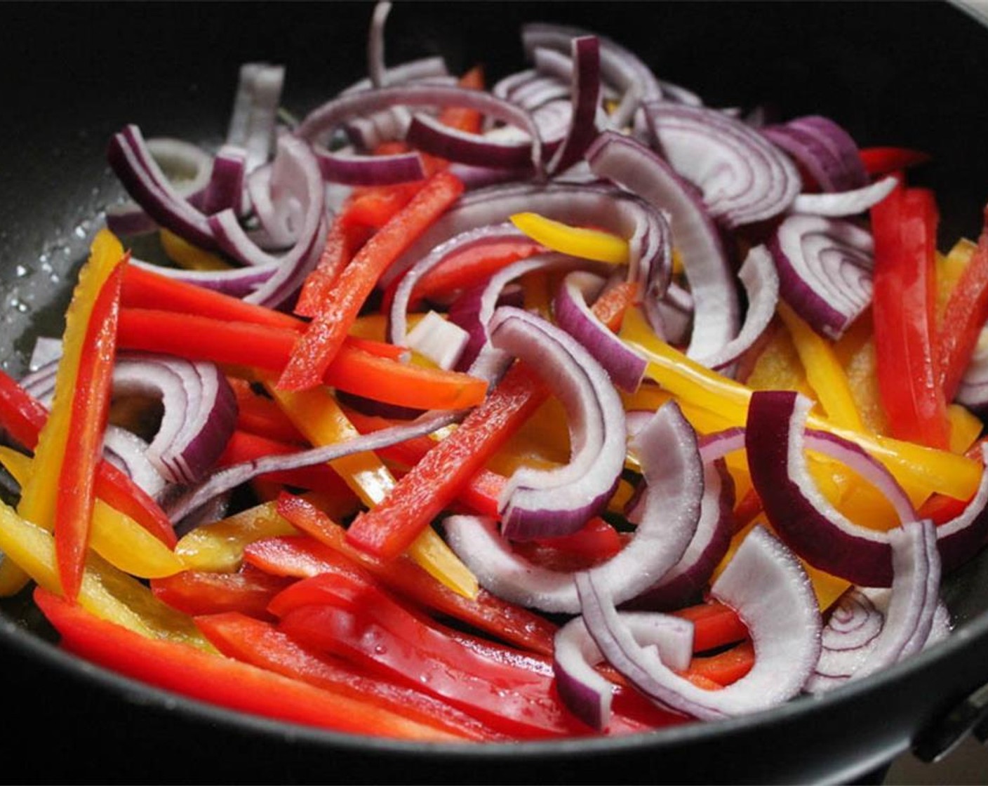 step 3 Transfer corn and zucchini to a bowl and let cool to room temperature. In the same pan, heat 1½ tablespoons of Olive Oil (1 1/2 Tbsp) When hot, add the Red Bell Pepper (1), Yellow Bell Pepper (1), Red Onion (1) and a generous pinch of salt.