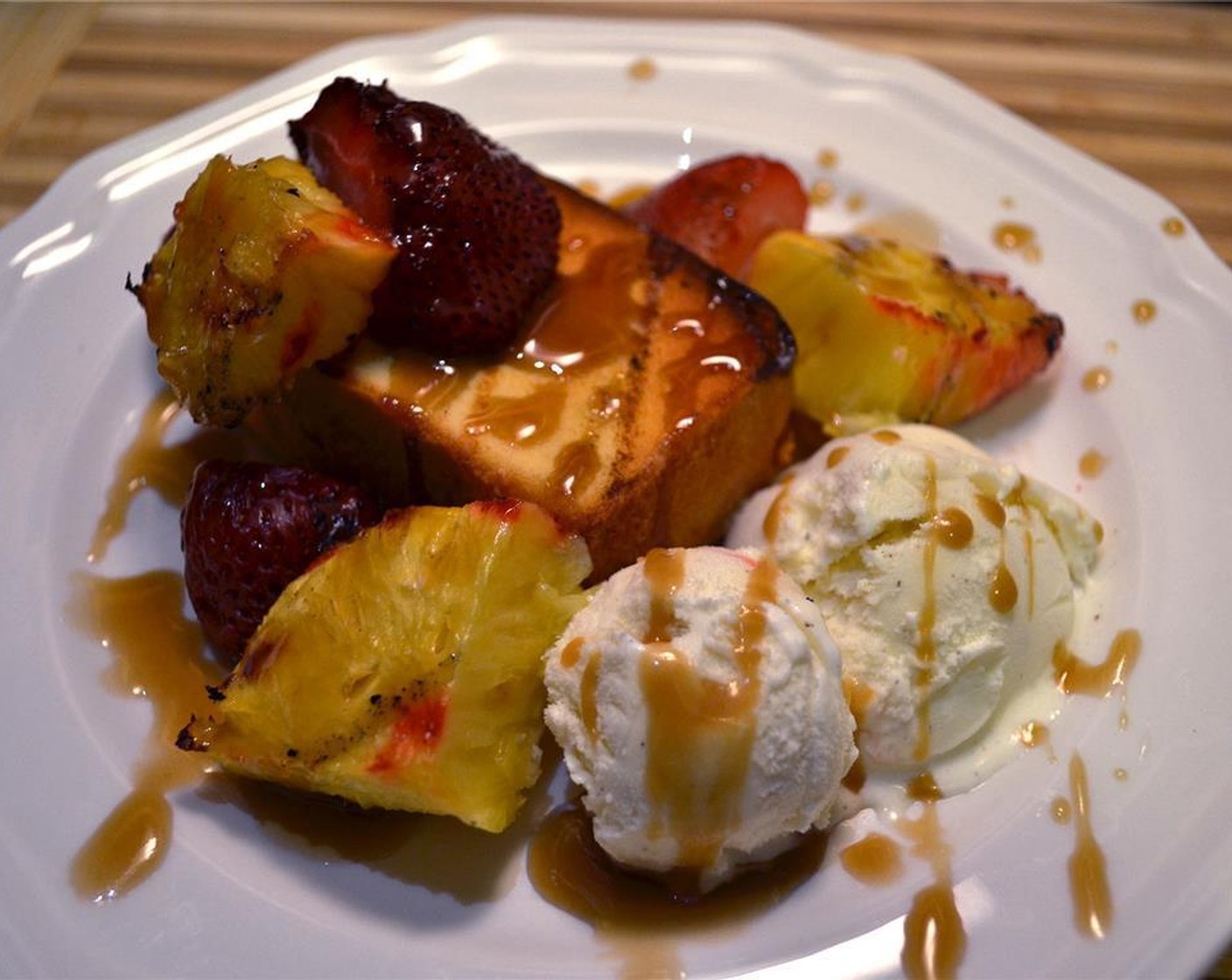 step 6 Scoop Vanilla Ice Cream (2 cups) into a dish, top with the grilled pound cake, cover with a skewer or two, and drizzle with the caramel sauce.