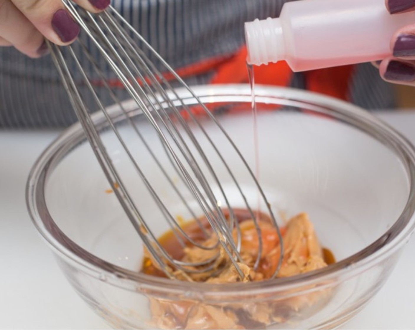 step 9 In a small mixing bowl combine Peanut Butter (1 pckg), 2 Tbsp of water, remaining Olive Oil (1/2 Tbsp), and Red Wine Vinegar (1/2 Tbsp). Whisk to mix thoroughly and emulsify.