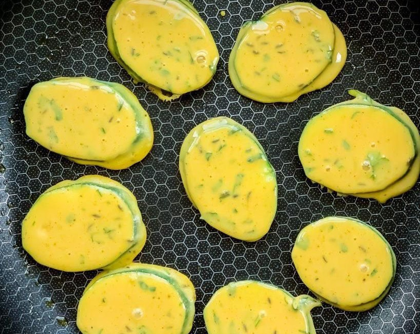 step 7 Once the pan is ready, start placing the batter dipped Zucchini (3) one by one, on the pan or griddle.