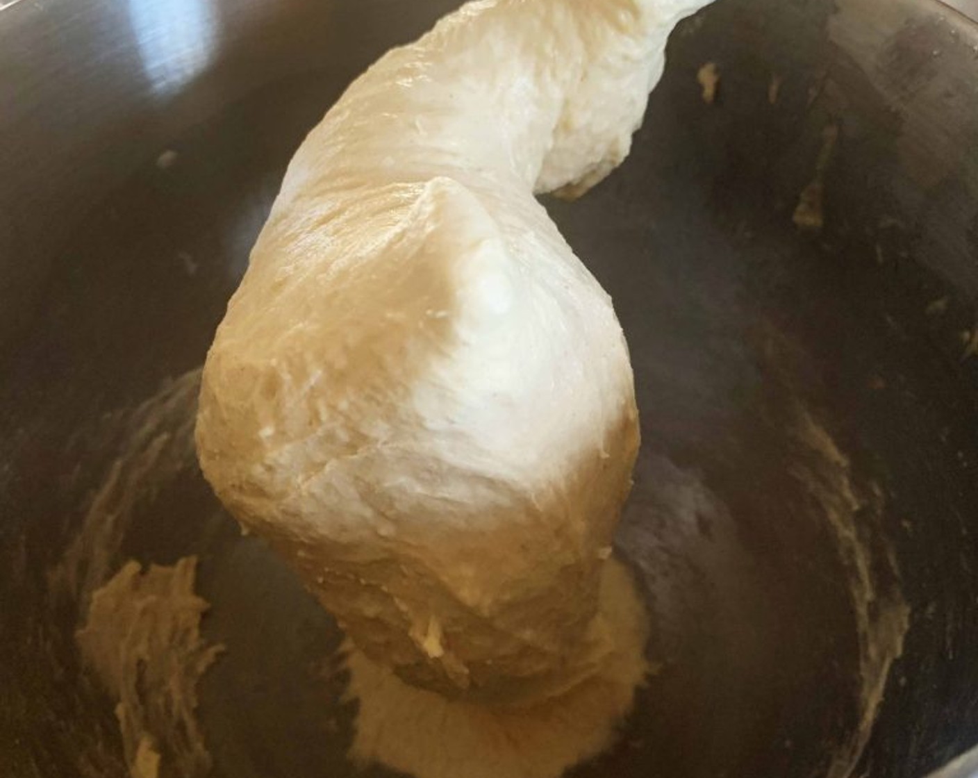 step 3 When the starter is ready add in Whole Milk (2.5 oz), Cream (7 oz), Granulated Sugar (4 Tbsp), aromatic mix, and Type 0 Flour (2 cups). Using the hook attachment of your standing mixer or by hand, knead the dough. As it starts to come together crack in one Eggland's Best Classic Egg (1), mix until it is completely absorbed. Next, add in the Oil (0.5 oz). Keep kneading, you need to get a soft and elastic dough.