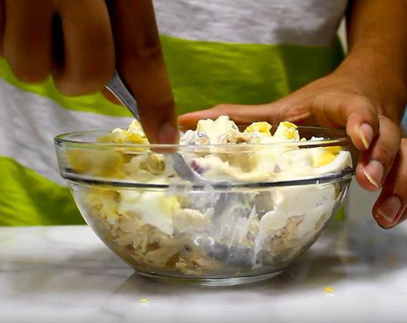 step 3 Add the Canned Tuna in Water (1 3/4 cups) and roughly chopped hard-boiled eggs and stir.