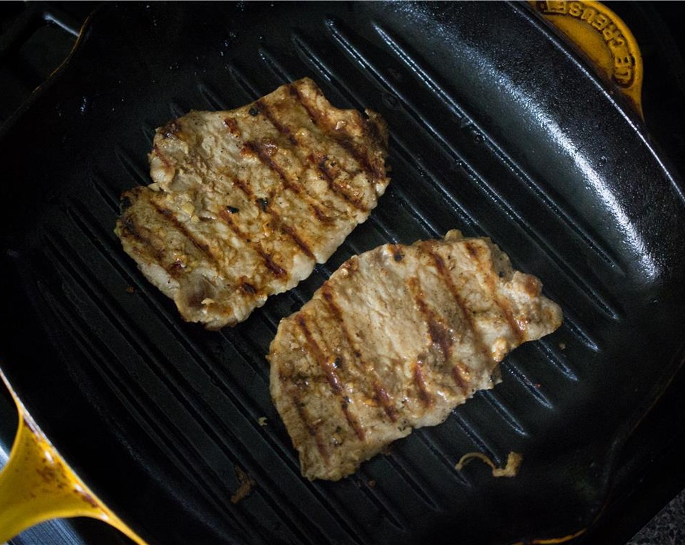 step 6 Heat a grill pan or another heavy-bottomed skillet over high heat – let the pan get ‘screaming’ hot. Working in batches, add the pork. Cook for 1-2 minutes per side, or until cooked through.
