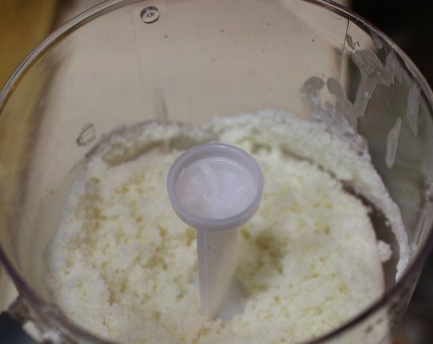 step 1 Put 10 grams of the desiccated coconut to one side and then place the rest of the Desiccated Coconut (1 1/2 cups) in a small food processor along with the Coconut Butter (2 Tbsp), Maple Syrup (2 Tbsp), Full-Fat Coconut Milk (3 Tbsp), Vanilla Extract (1 tsp), Ground Cinnamon (1/2 tsp) and Sea Salt (1/4 tsp) then blend for 2-3 minutes until the mixture resembles a thick paste.