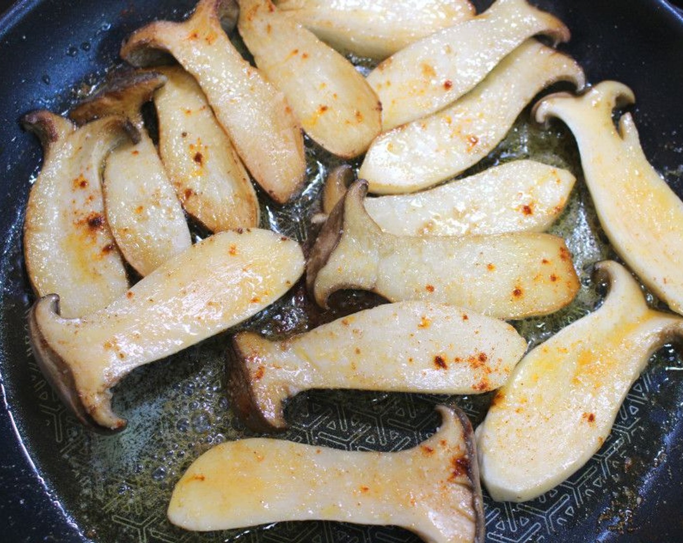 step 5 Once the potatoes are almost done, melt a knob of Butter (to taste) in a pan over medium heat, and sauté the Oyster Mushrooms (5) on both sides until golden brown. Season with Kosher Salt (to taste) and Cayenne Pepper (to taste).