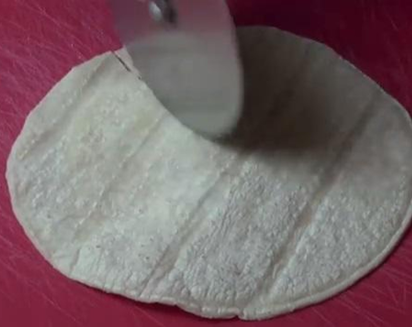 step 2 Cut your White Corn Tortilla (1 pckg) into wedges.