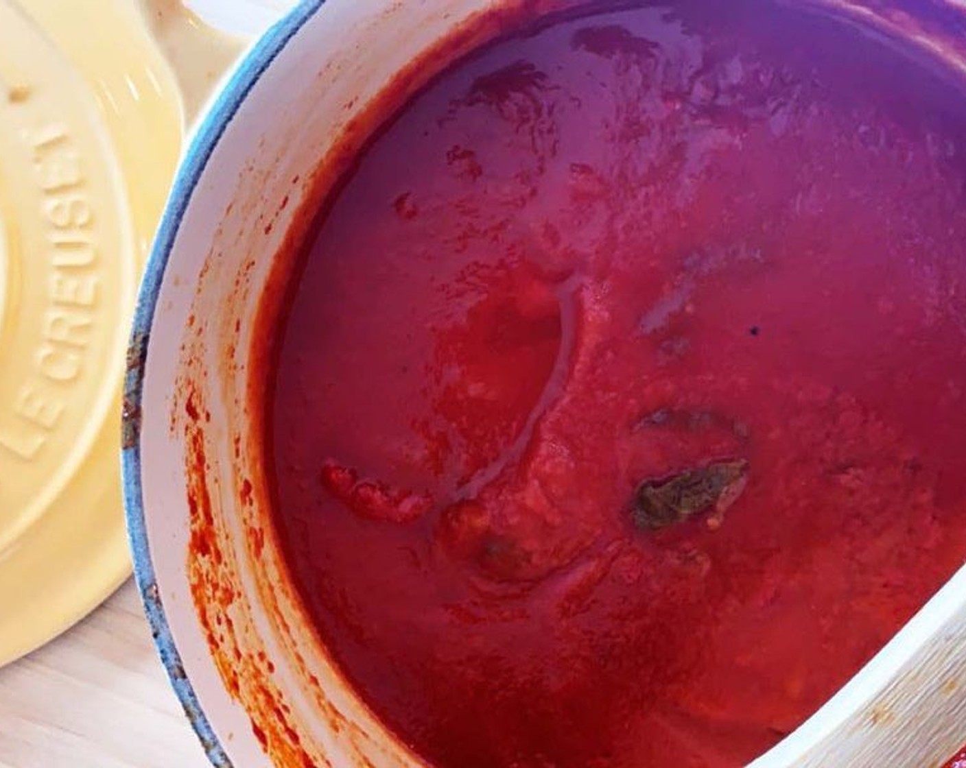 step 2 Pour in the bottle of Tomato Passata (1 bottle), season with Salt (to taste), Ground Black Pepper (to taste), and Fresh Basil Leaves (3). Cover with a lid and let cook on low heat for 2 hours. The sauce should be thick and flavourful.