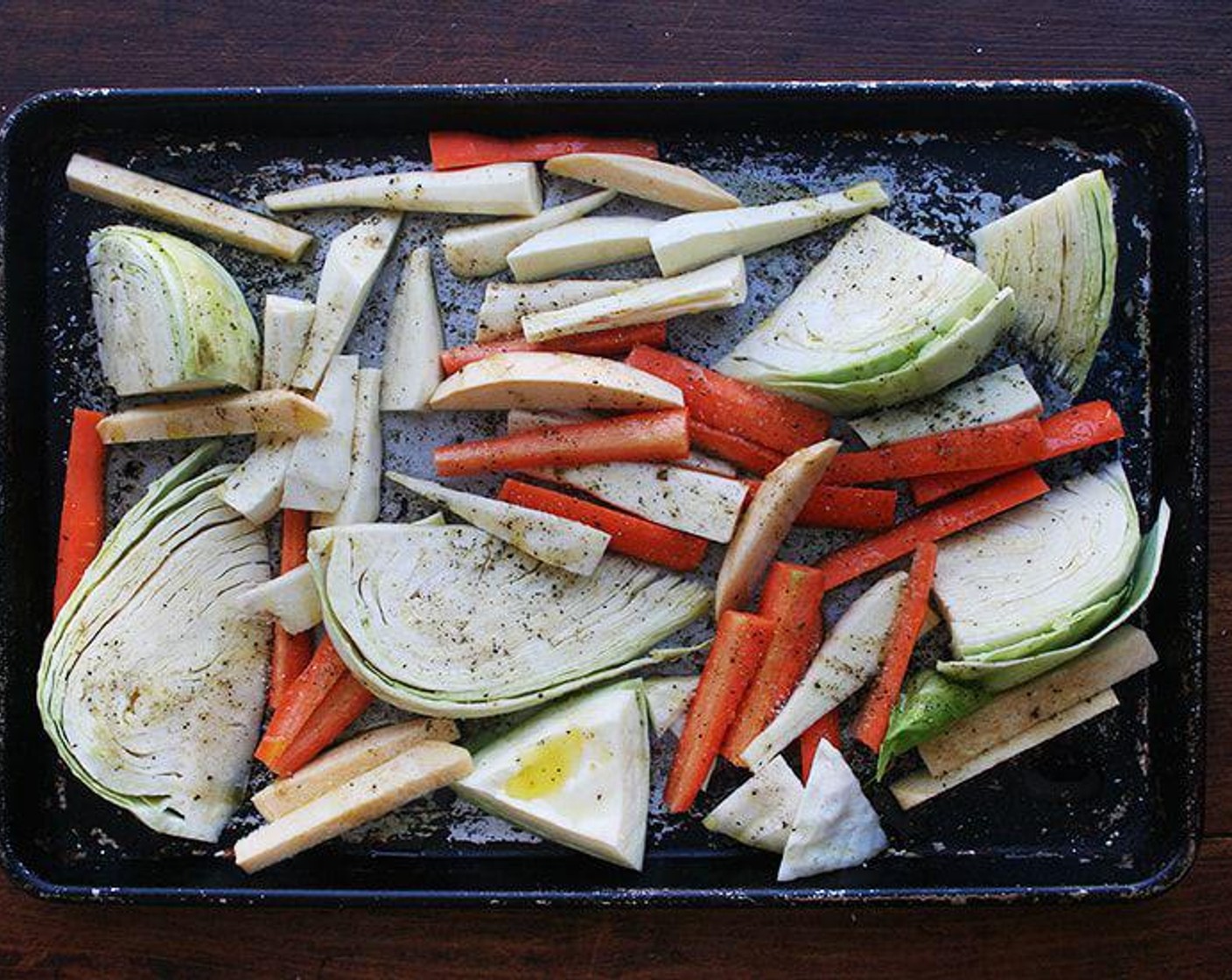 step 3 Spread vegetables onto a sheet pan. Season with Kosher Salt (to taste) and Freshly Ground Black Pepper (to taste). Drizzle with Olive Oil (2 Tbsp) to coat. Toss gently, then spread in an even layer. Roast for 20 minutes.