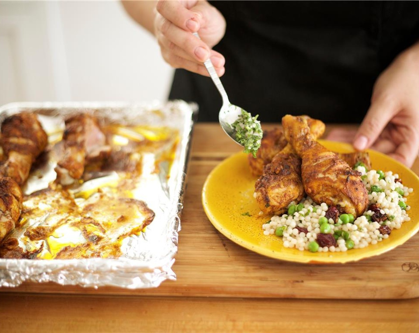 step 15 Stir the chopped mint into couscous. Season with a pinch of salt and a pinch of pepper to taste if needed. Arrange a bed of couscous onto each of the two plates. Position chicken over half of couscous. Drizzle relish over chicken and lightly over couscous.