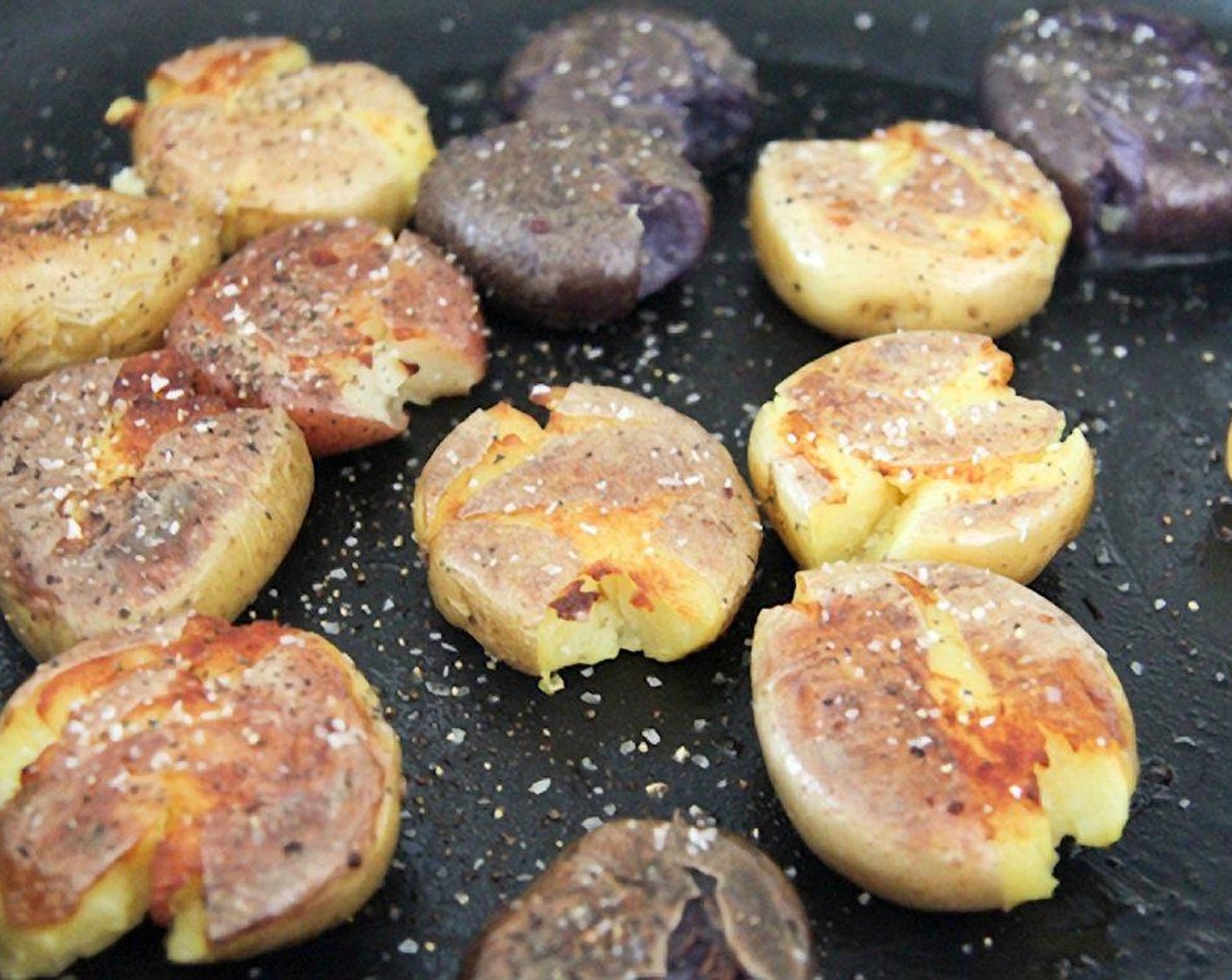 step 8 Season the potatoes generously with Salt (to taste) and Ground Black Pepper (to taste) while the potatoes are still hot.