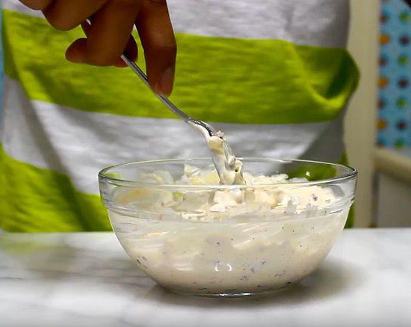 step 1 In a mixing bowl, add Red Onion (1/4 cup), Celery (1/4 cup), Mayonnaise (2/3 cup), McCormick® Garlic Powder (1 tsp), Salt (to taste), Ground Black Pepper (to taste), and juice from Lemon (1). Mix until all combined.