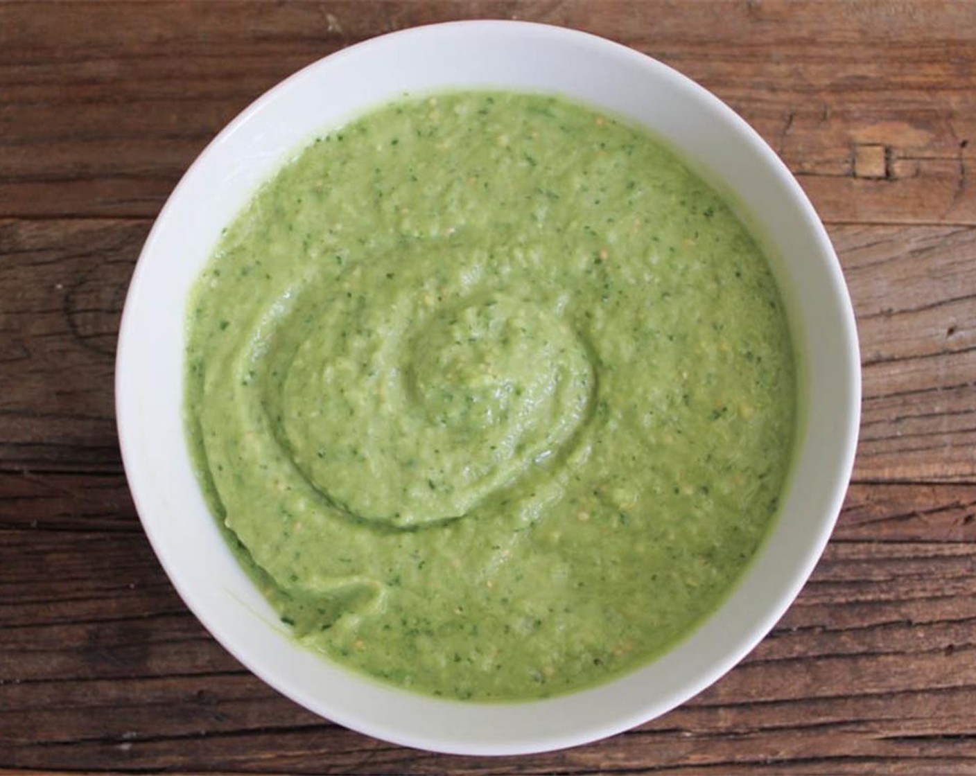 step 6 Process until you have a coarse purée. Pour into a bowl and season with a little more salt if necessary. Press a layer of plastic wrap onto the surface of the salsa verde and set aside until ready to use.