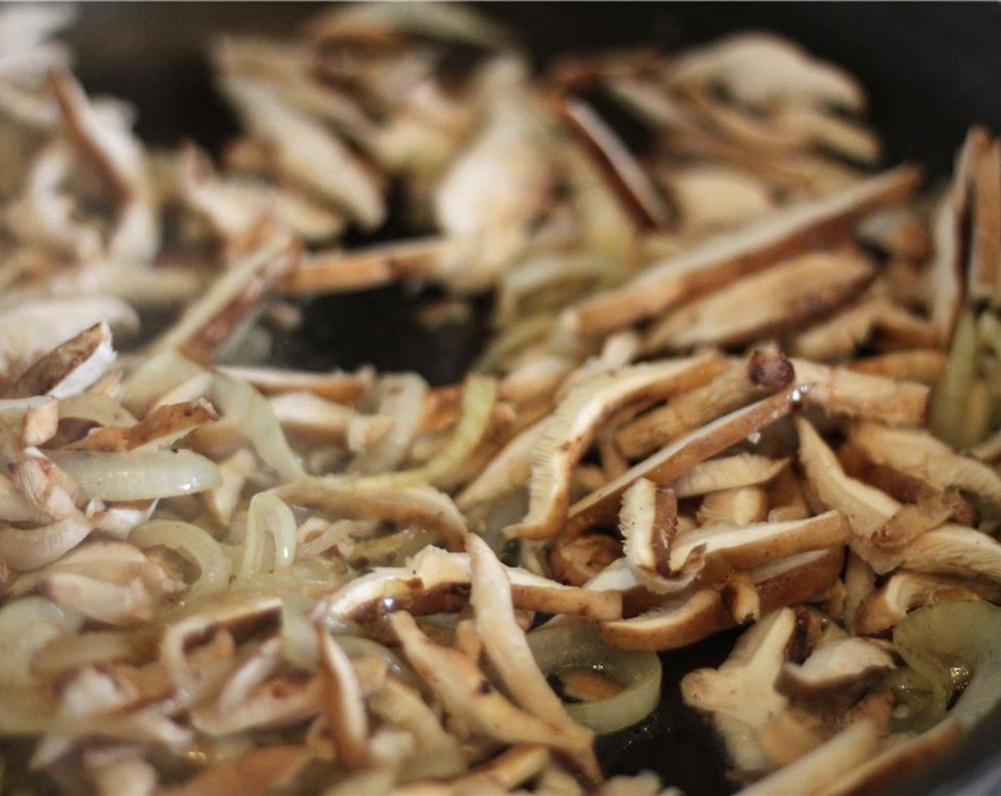 step 6 Add the remaining Butter (1 tsp), melt and add the shitake mushroom and Vegetable Stock (4 Tbsp). Season with salt. Turn up the heat and sautee until browned.