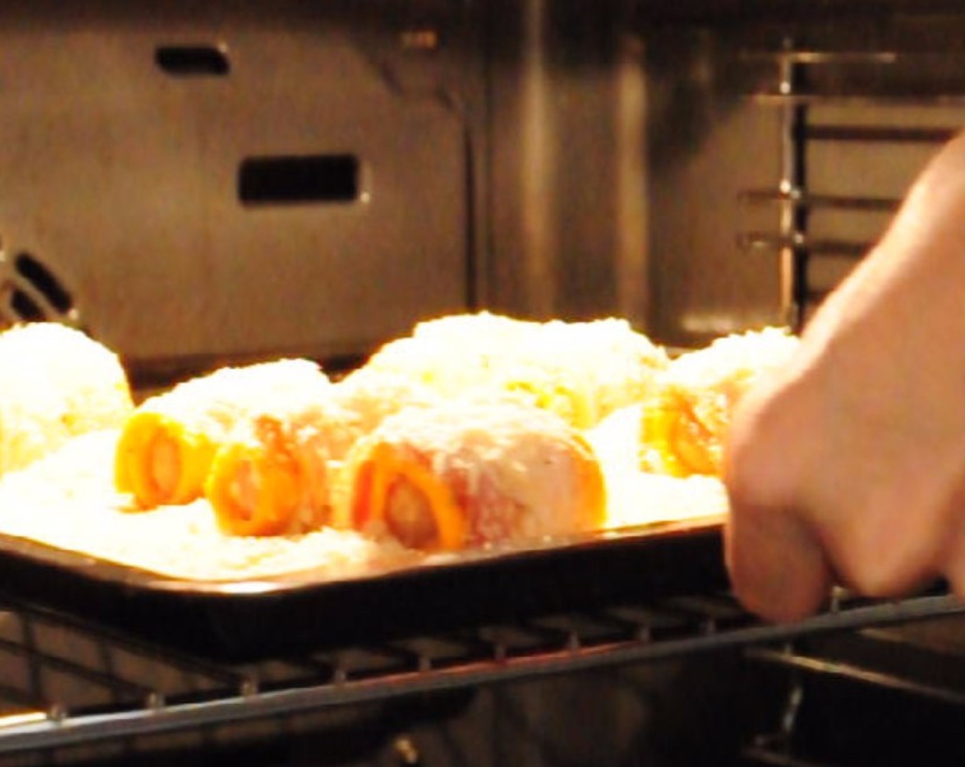 step 10 Place the baking dish with the rolls into the preheated oven.