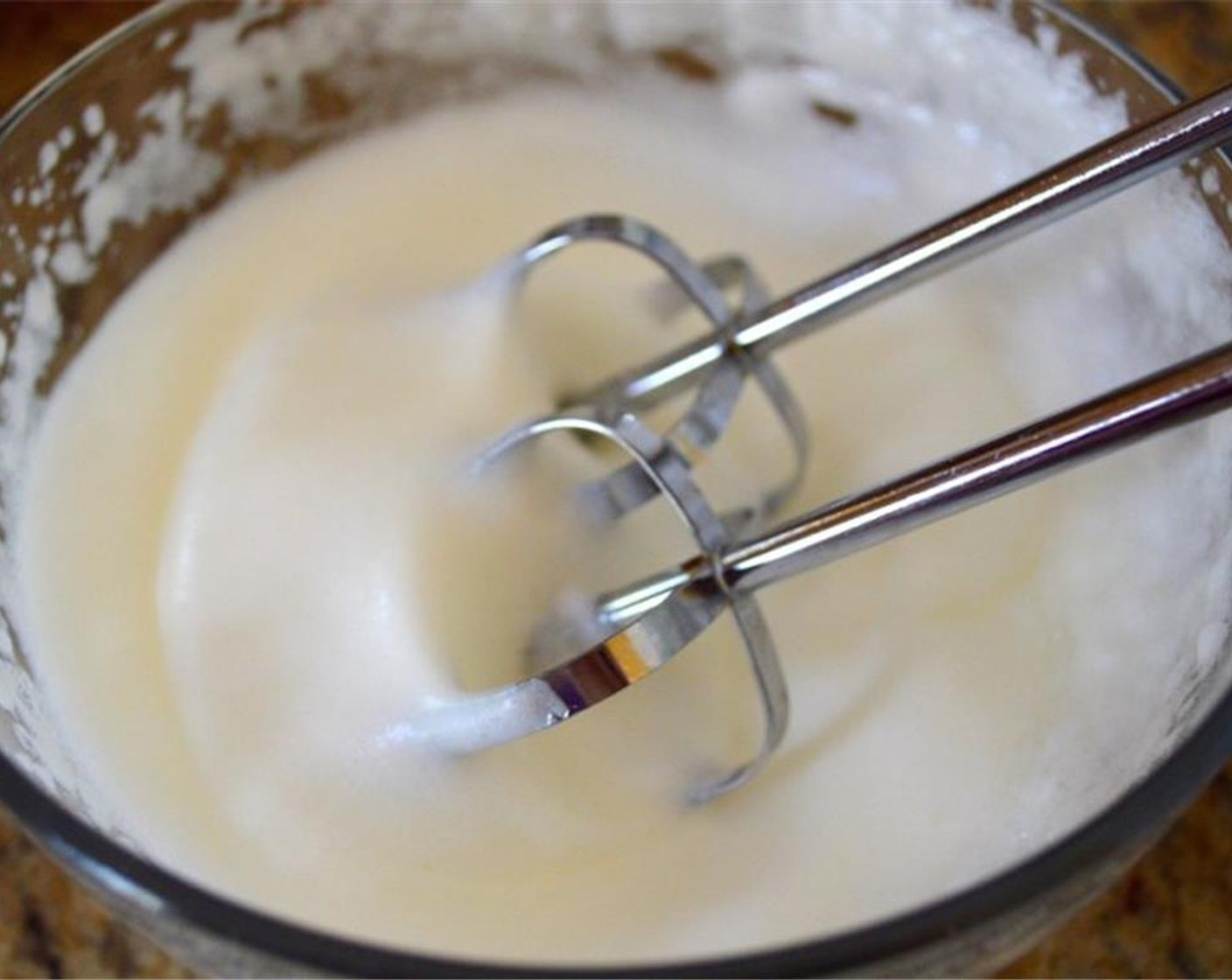 step 4 Take the Egg Whites and whip them up with a hand mixer until they are fluffy and stiff.