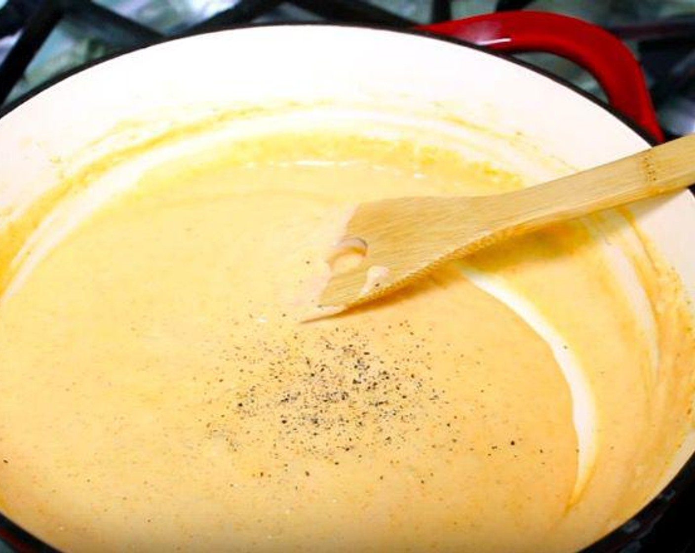 step 2 In a saucepan, melt Butter (4 Tbsp). Add All-Purpose Flour (4 Tbsp), whisking well. Add Whole Milk (2 1/4 cups), Simply Organic Garlic Powder (1 tsp), Simply Organic Onion Powder (1/2 tsp), and Paprika (1/2 tsp). Stir until the mixture thickens. Season with Salt (to taste), and Ground Black Pepper (to taste).