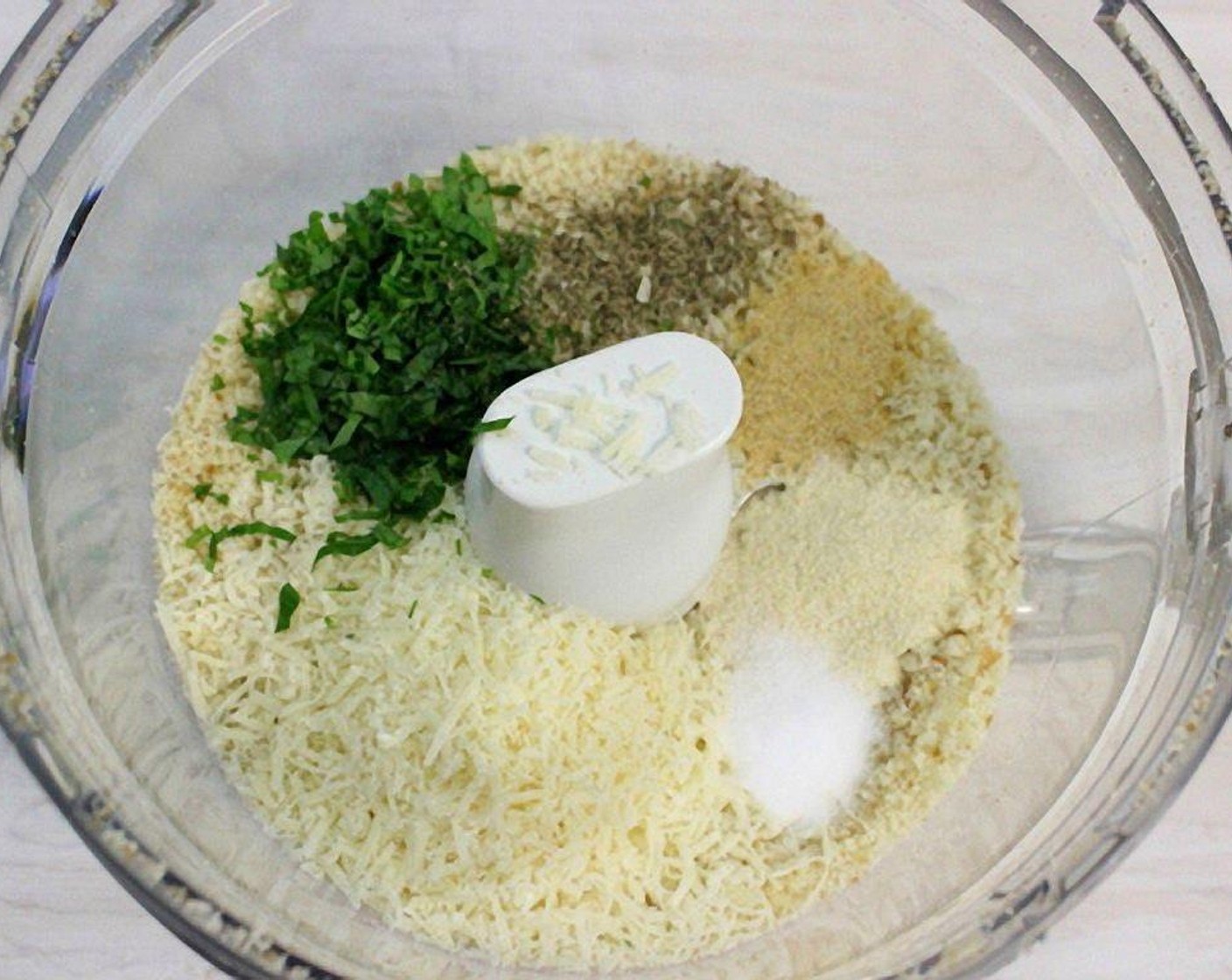 step 5 Add the rest of the breadcrumb ingredients – Simply Organic Onion Powder (1 tsp), Simply Organic Garlic Powder (1 tsp), Dried Mixed Herbs (1/2 tsp), Fresh Parsley (1 Tbsp), and Parmesan Cheese (1/3 cup). Mix until evenly combined.
