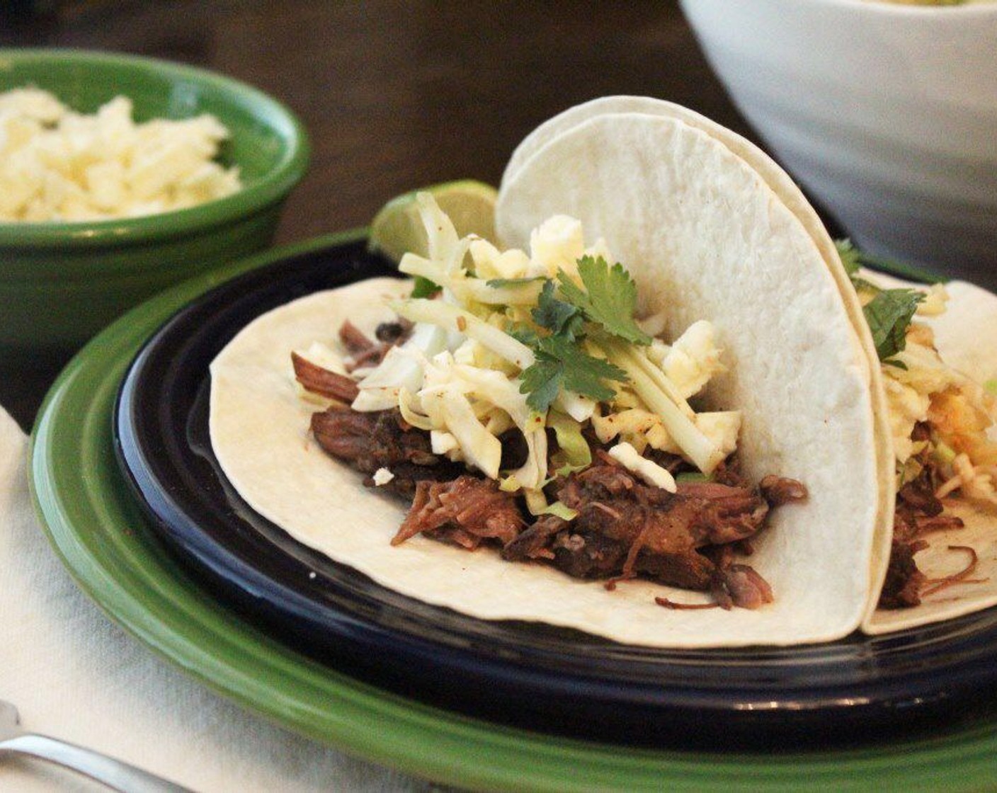 step 14 For serving, I like Flour Tortillas (to taste), Limes (2), Fresh Cilantro (1 bunch), and mexican crumbling cheese - cotija or queso fresco or cheddar cheese work really well.