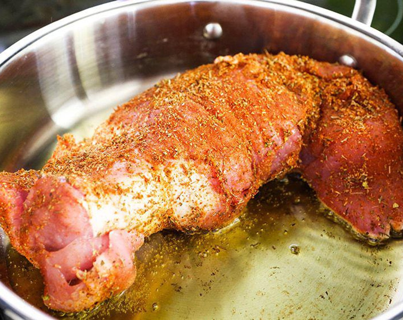 step 5 Heat the Olive Oil (3 Tbsp) in a skillet over medium heat and add the pork loin.