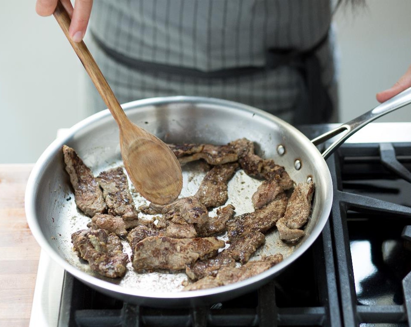 step 6 When hot, add only HALF the beef and stir-fry until golden brown, about 5 minutes. Transfer the beef to a plate and repeat with the second batch. Transfer this batch to the plate and hold.