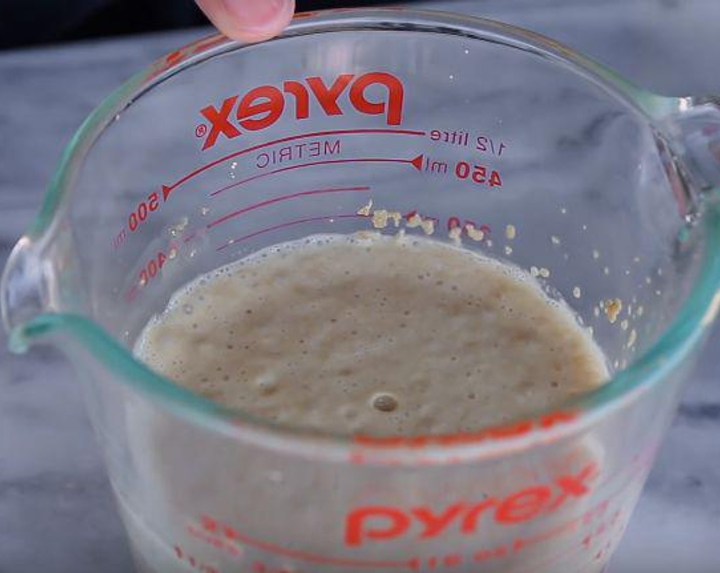 step 1 In a jug where you have the Water (1 cup), add Granulated Sugar (2 Tbsp) and sprinkle over the Active Dry Yeast (2 tsp), mix and let it sit for 5-10 minutes or until foamy.