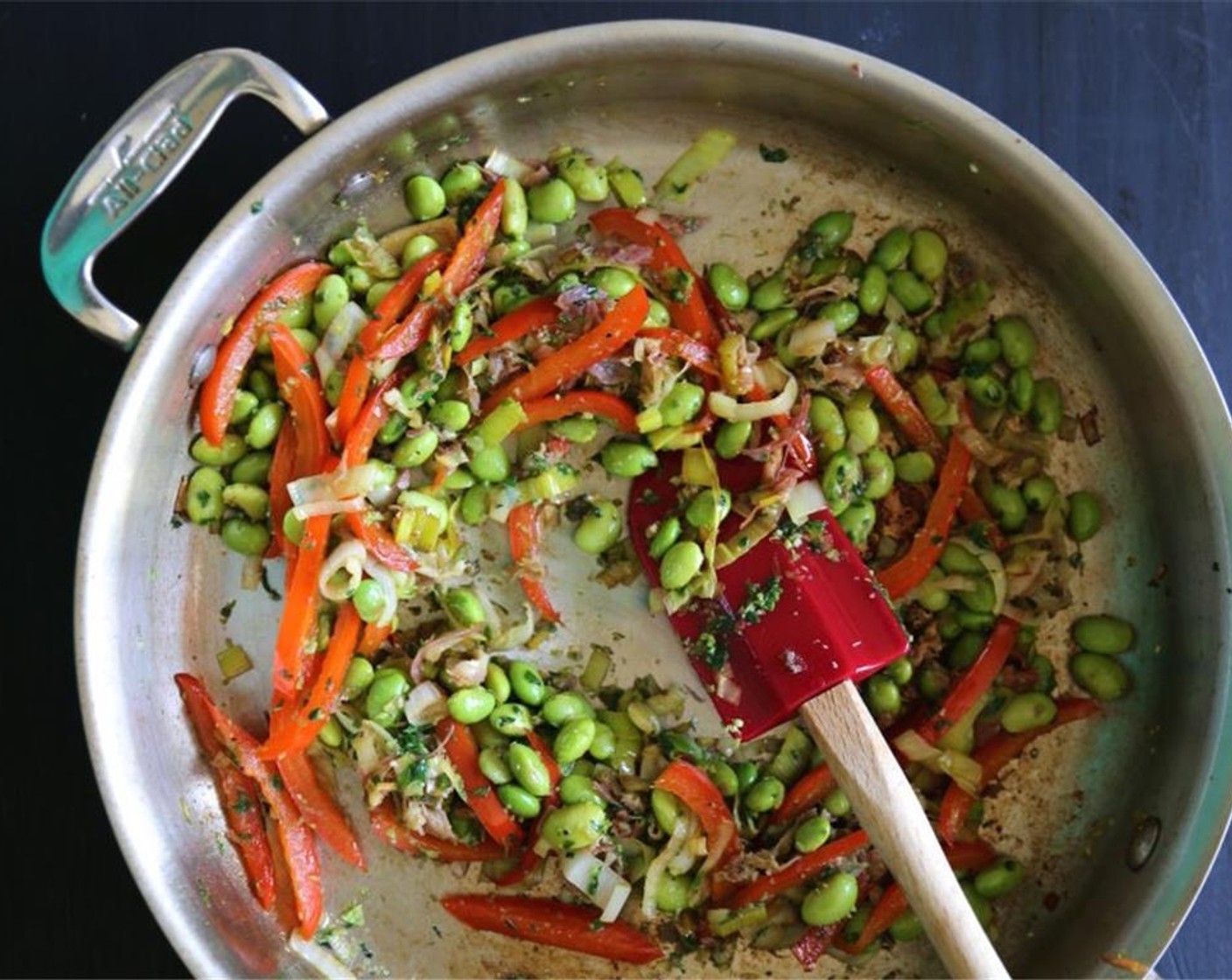 step 8 Next, add the fava beans with a little salt and pepper. Stir to combine. if you need to add olive oil to keep the veggies from sticking you can do that now.