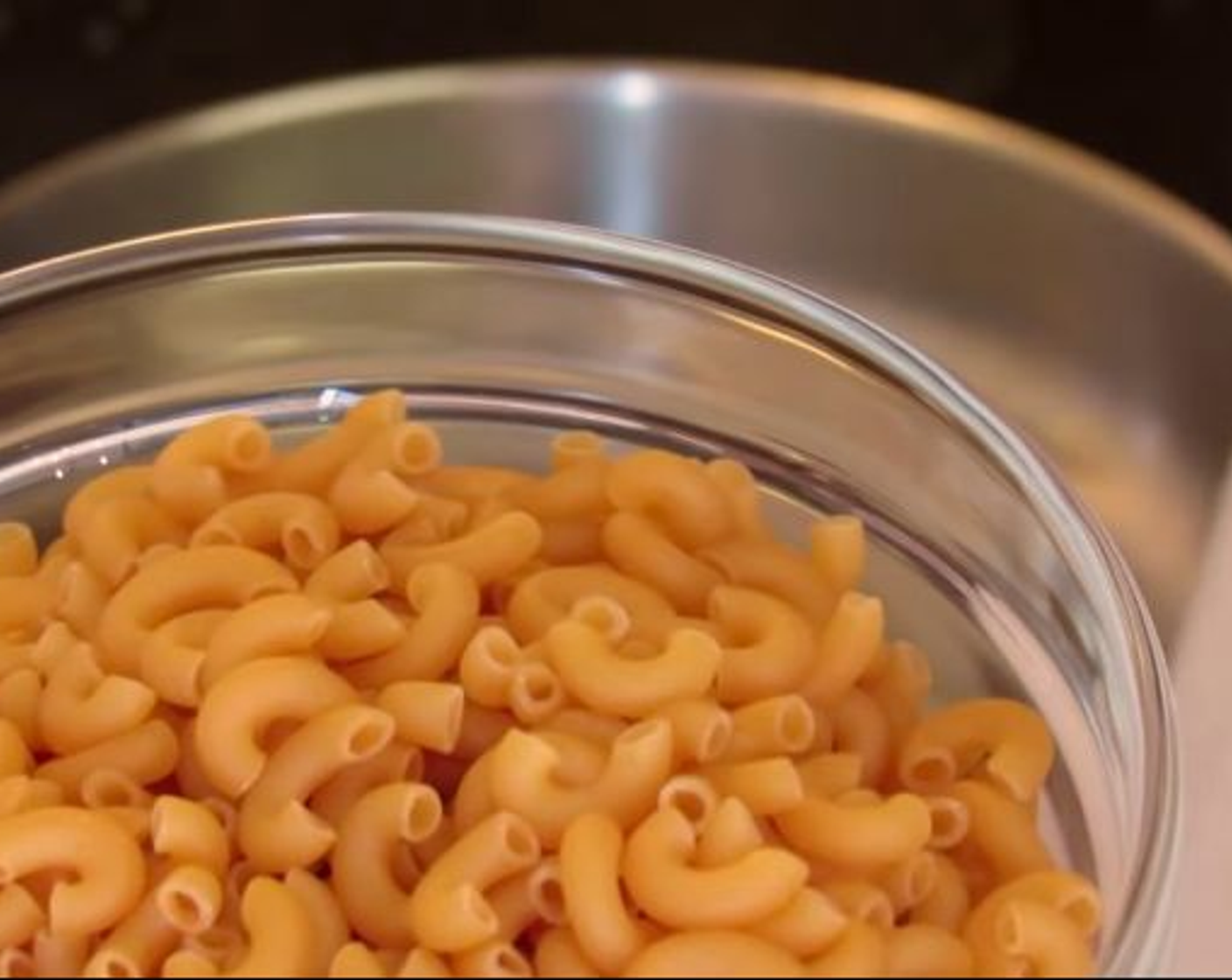 step 1 Bring a pot of water to boil, add some salt and Elbow Macaroni (12 oz). Cook for about 6 minutes.