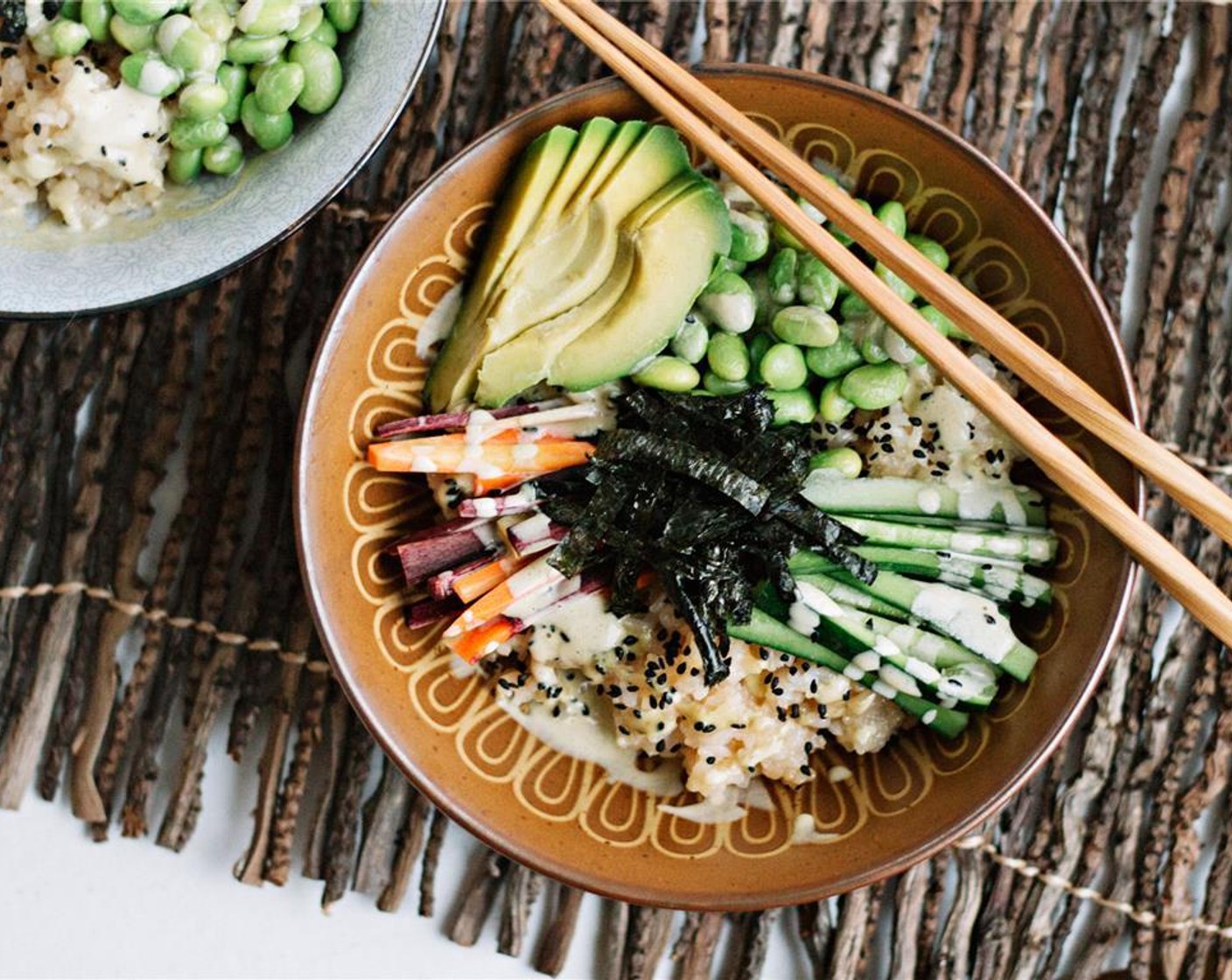 step 7 Drizzle with wasabi mayo to taste, then set a tangle of nori in the center of the bowl. Serve immediately. Enjoy!