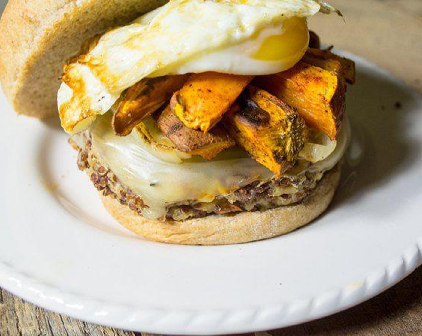Quinoa Veggie Burger Topped with Sweet Potato and Eggs