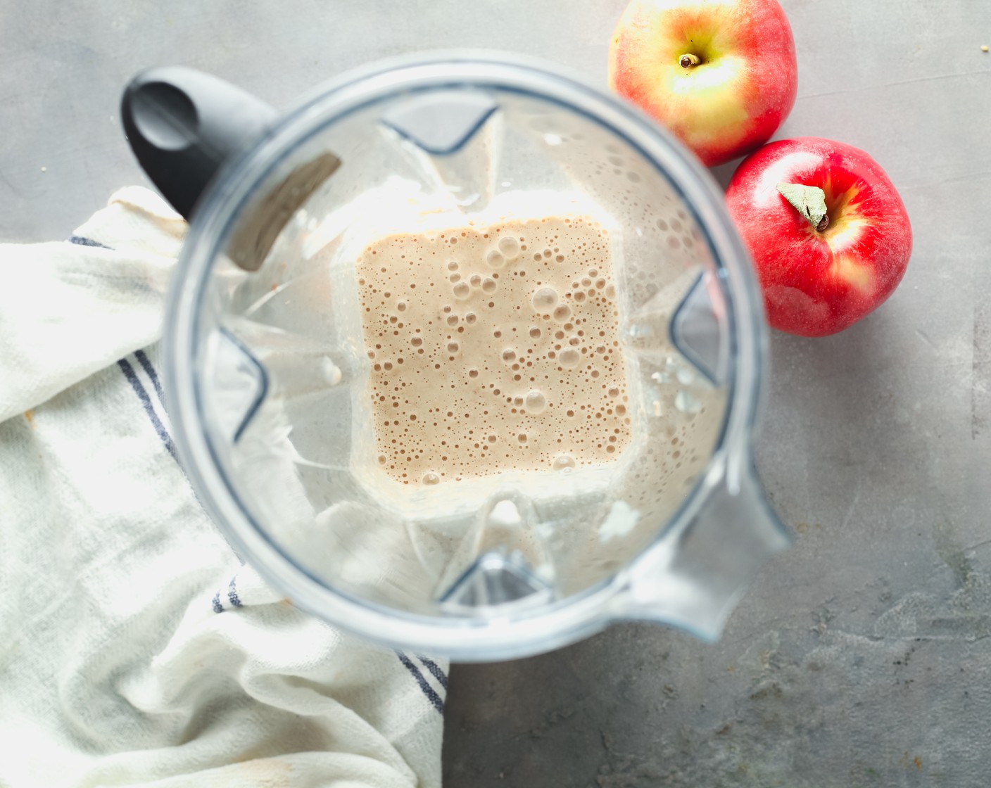 step 1 Add the Apple Sauce (1/2 cup), Milk (1/2 cup), Old Fashioned Rolled Oats (1 cup), Farmhouse Eggs® Large Brown Eggs (2), Maple Syrup (2 Tbsp), Vanilla Extract (1/2 tsp), Baking Powder (1/2 tsp), Salt (1 pinch), and Simply Organic Cinnamon, Ground (1 tsp) to a blender. Blend for 1 minute, until smooth.