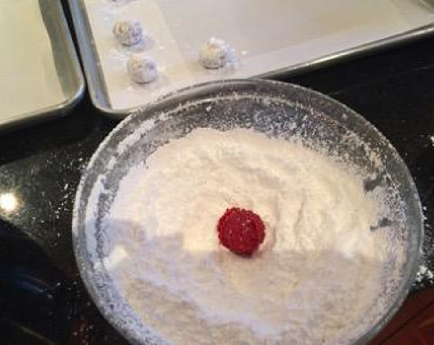 step 6 Scoop with a cookie scoop then roll in Powdered Confectioners Sugar (as needed) and coat really well.