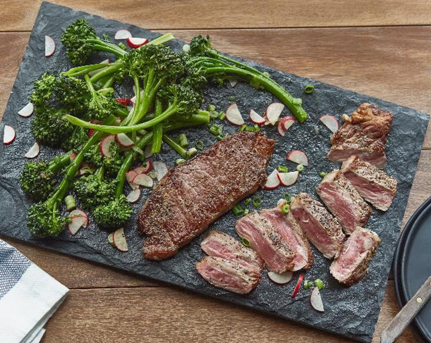 New York Steaks with Broccolini Radish Salad