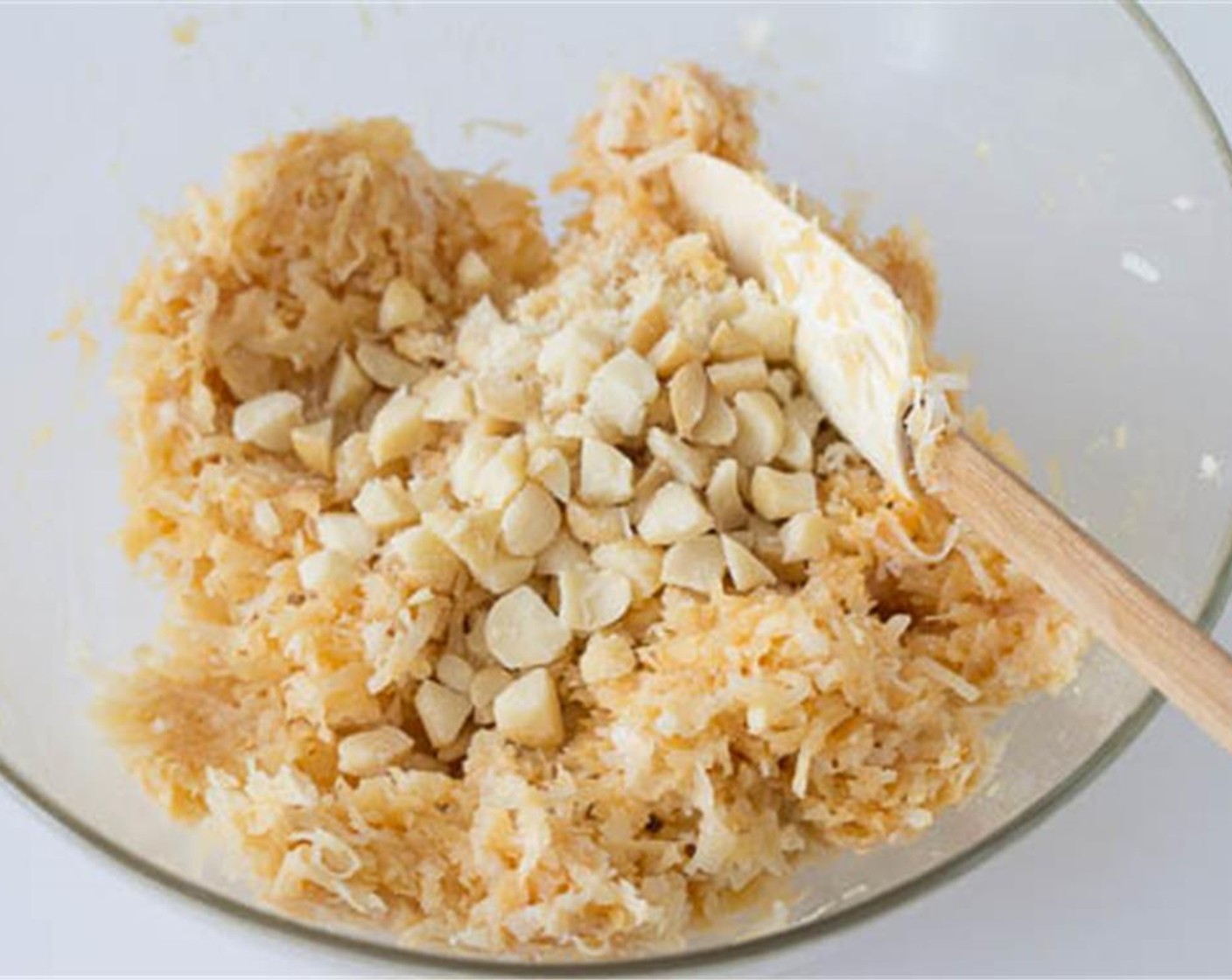 step 3 Coarsely chop Macadamia Nuts (1/3 cup) and mix them in with the coconut mixture.