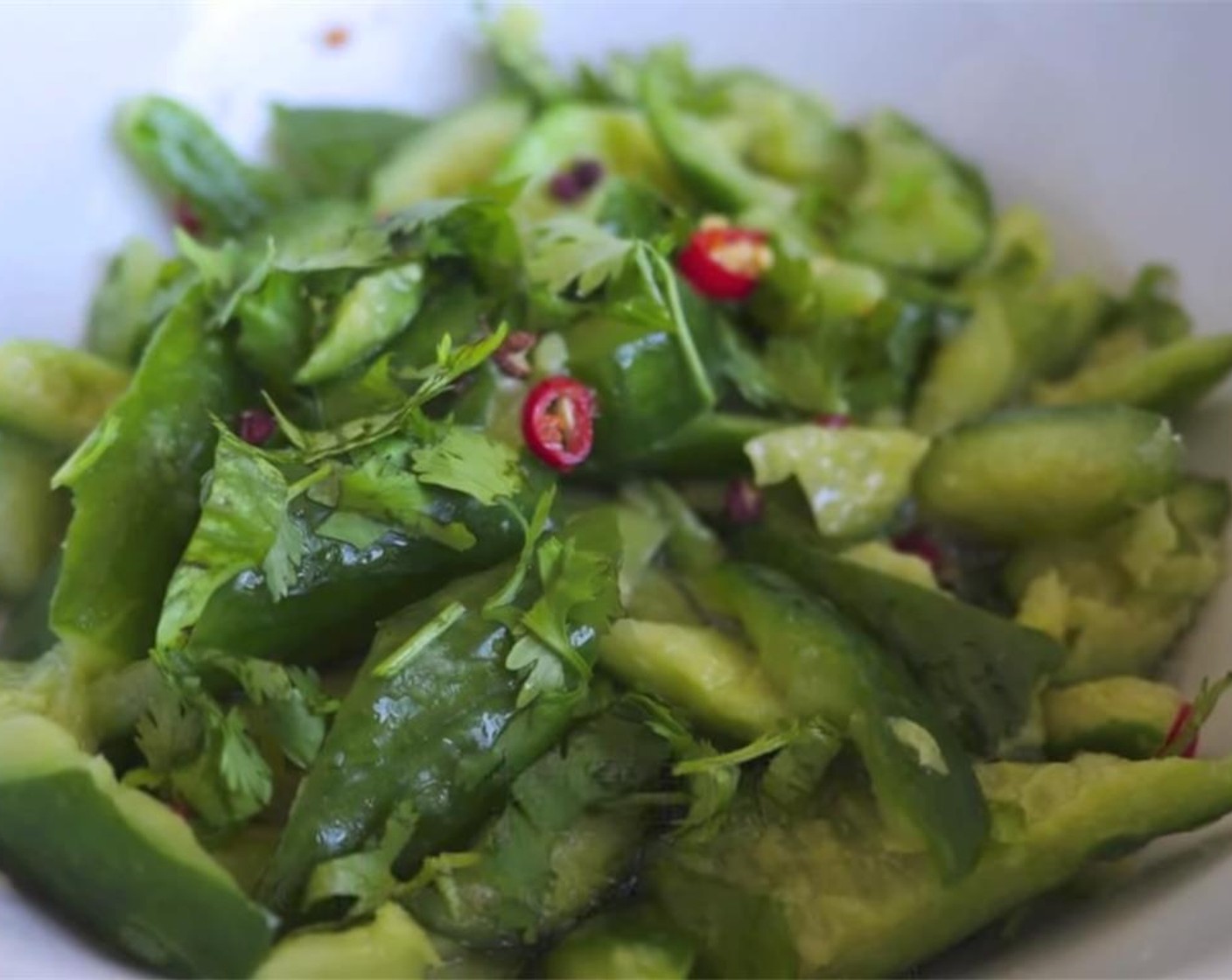 step 4 Squeeze cucumbers of remaining liquid, then rinse thoroughly. Toss with the dressing, and top with Fresh Cilantro (to taste). Serve, and enjoy!