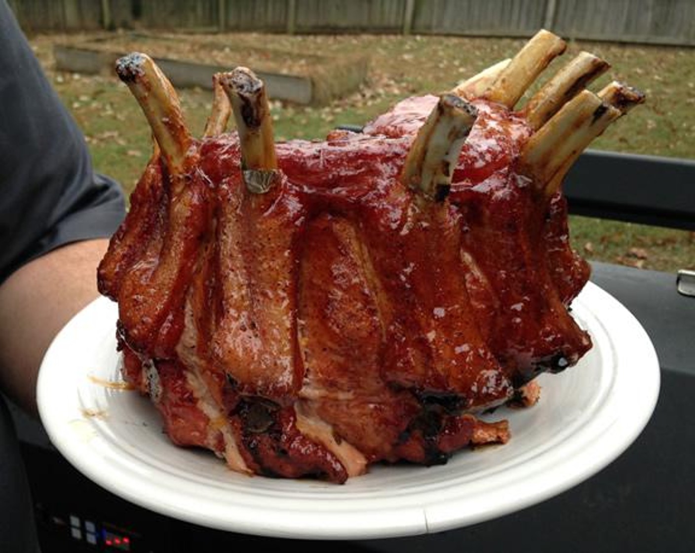 step 6 Brush the peach glaze over the Smoked Crown Roast of Pork and let it cook for another 10-15 minutes. At this point, the internal temperature should be right at 145 degrees F (65 degrees C).