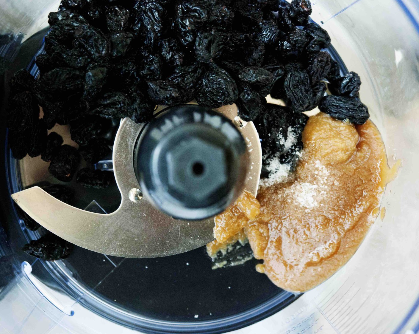 step 8 In a food processor place Sun-Maid Raisins (1 cup), Coconut Jam (2 Tbsp), Kosher Salt (1/2 tsp), and Water (2 Tbsp).