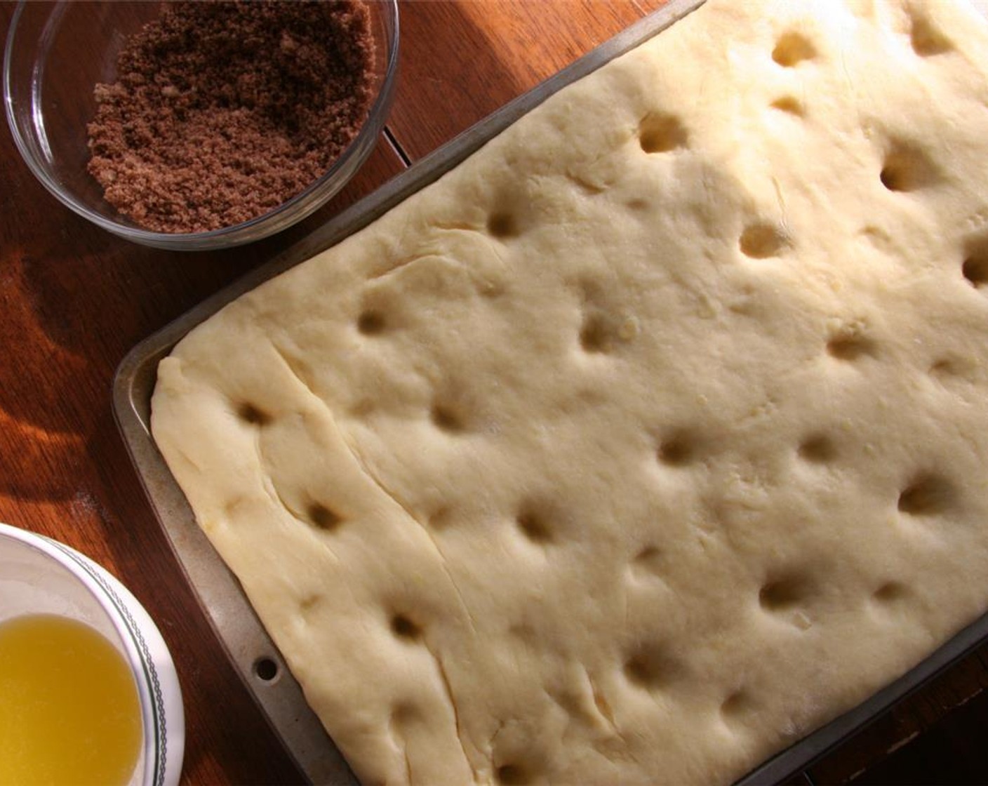 step 9 Dimple the dough by making deep indentations with your fingertips at 1 1/2-inch intervals.