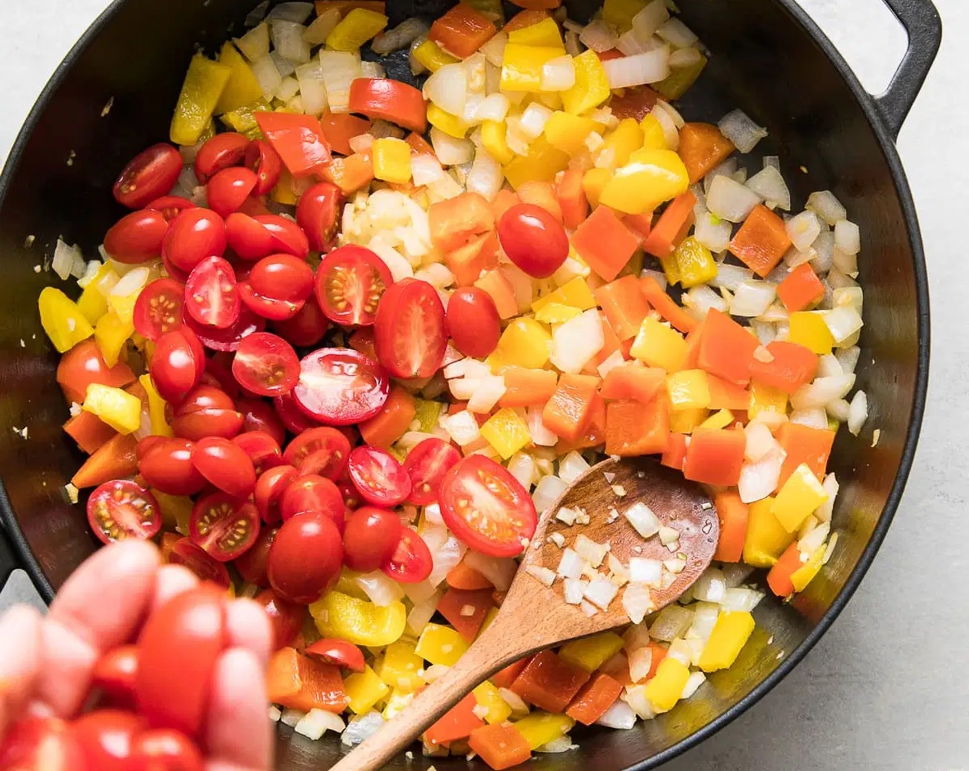 step 7 Add tomatoes, mix well and cook for 5 minutes.